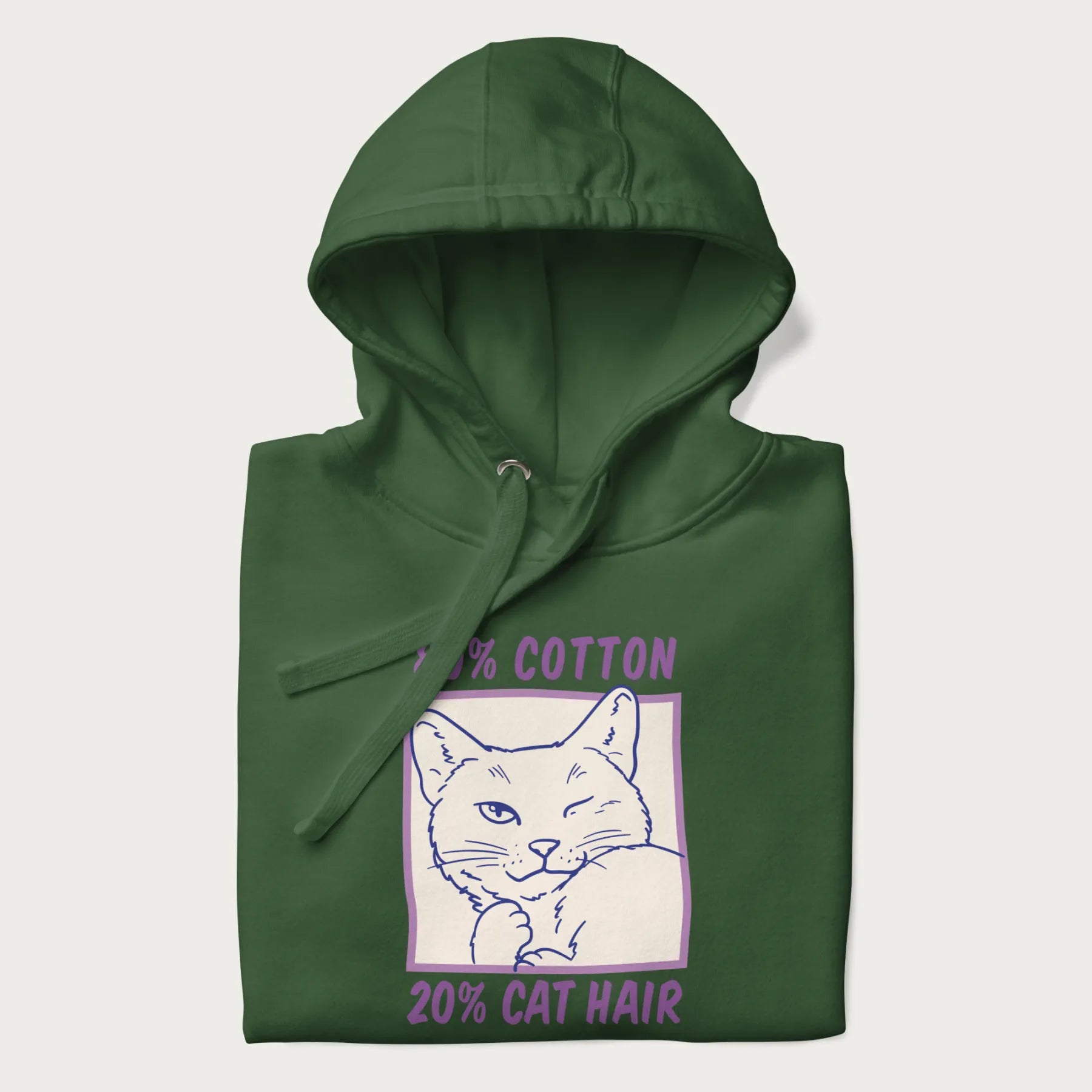 Folded forest green hoodie with graphic of a winking cat with the text "80% cotton 20% cat hair".