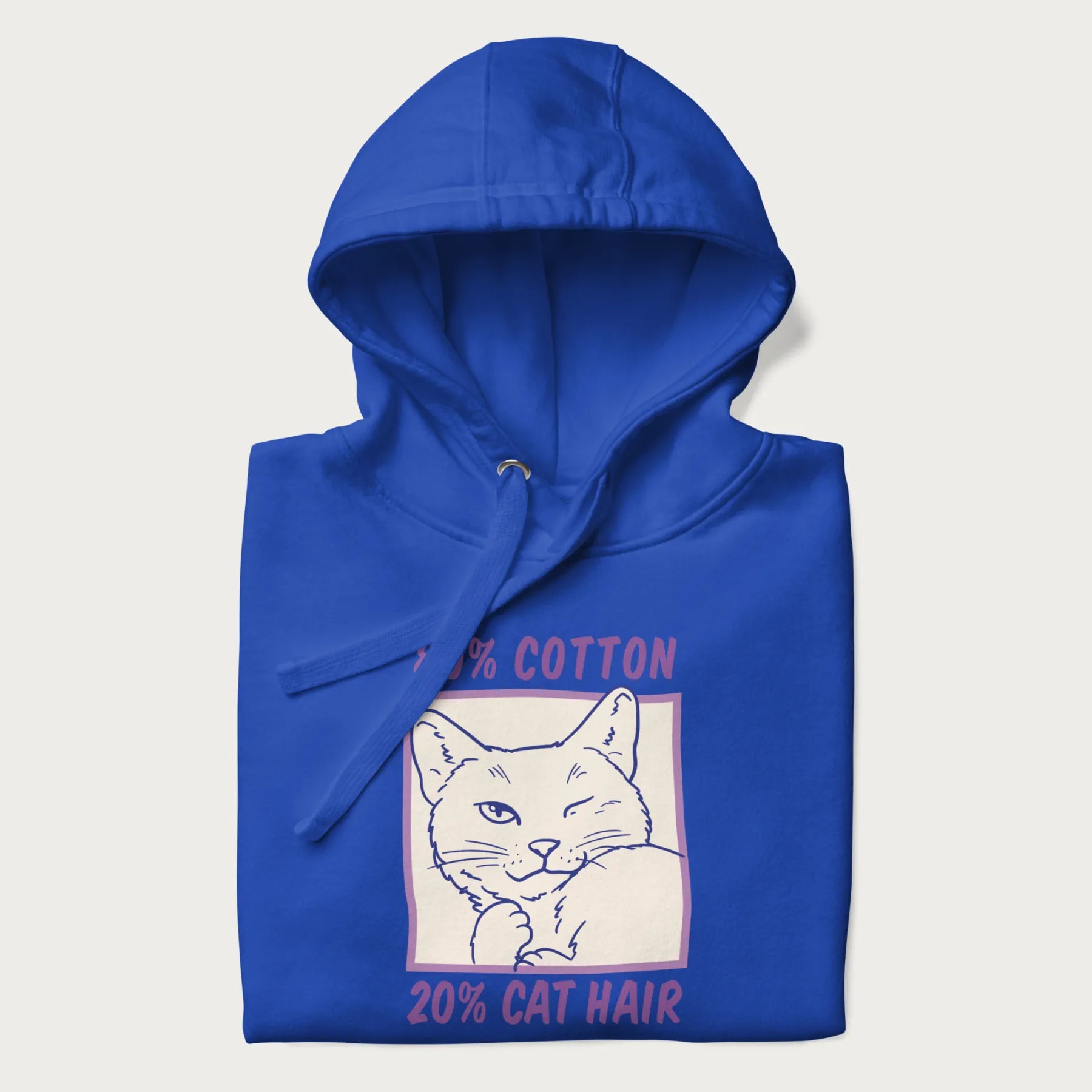 Folded royal blue hoodie with graphic of a winking cat with the text "80% cotton 20% cat hair".