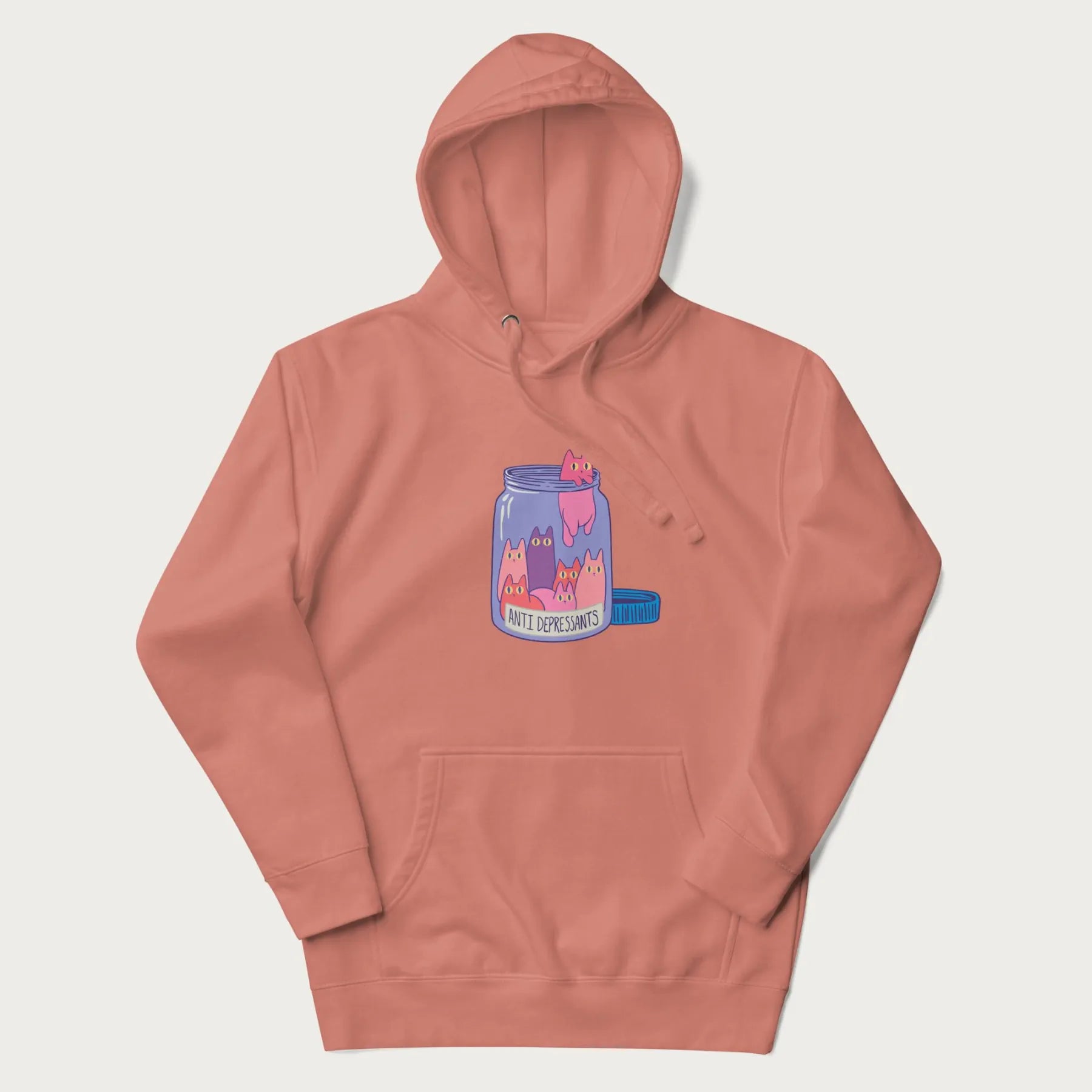 Cartoon cats in a clear jar labeled 'Anti Depressants' printed on a light pink hoodie.