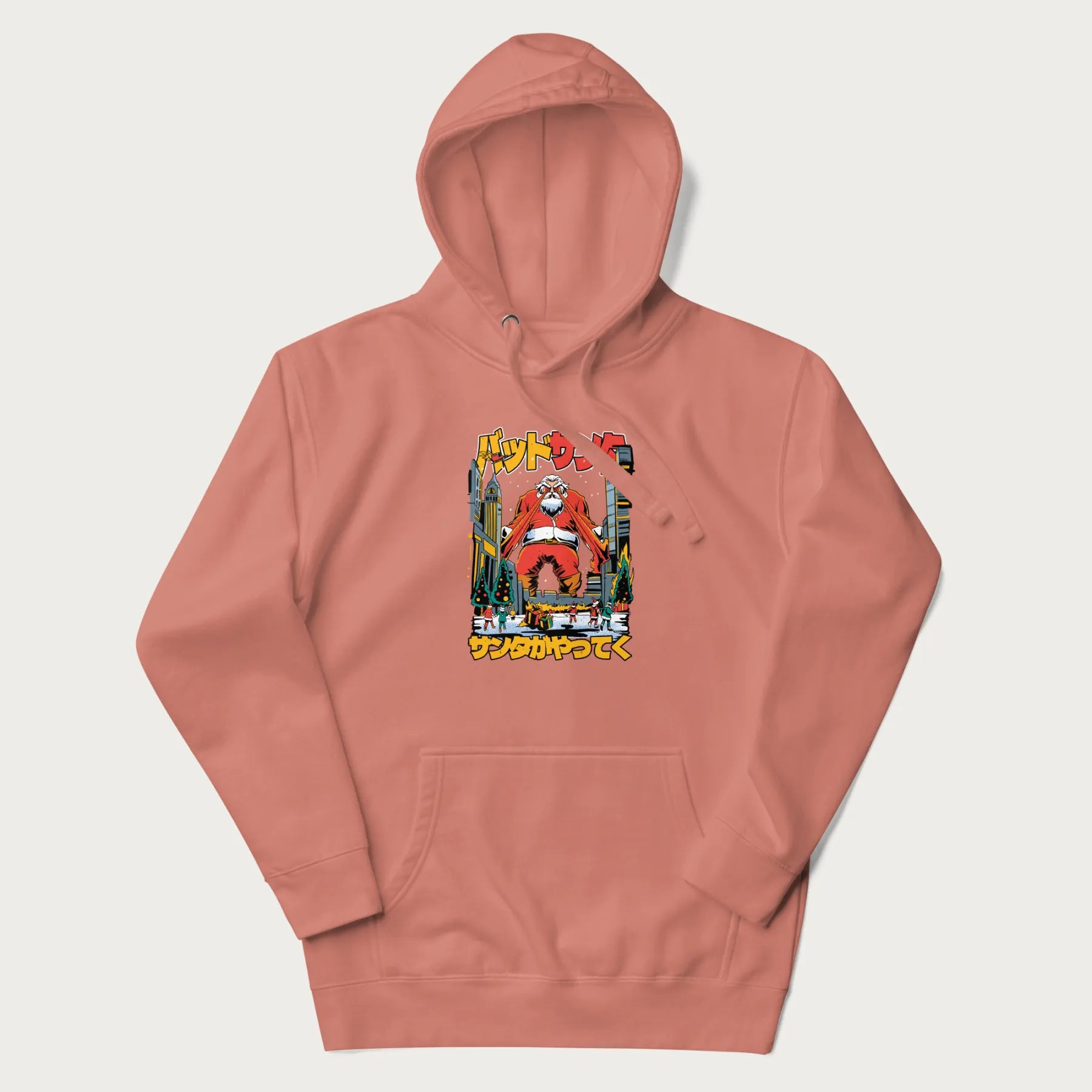 Light pink hoodie with Japanese graphic of Santa Claus with laser eyes attacking a festive city, with the Japanese text 'パッドサンタ' (Bad Santa).