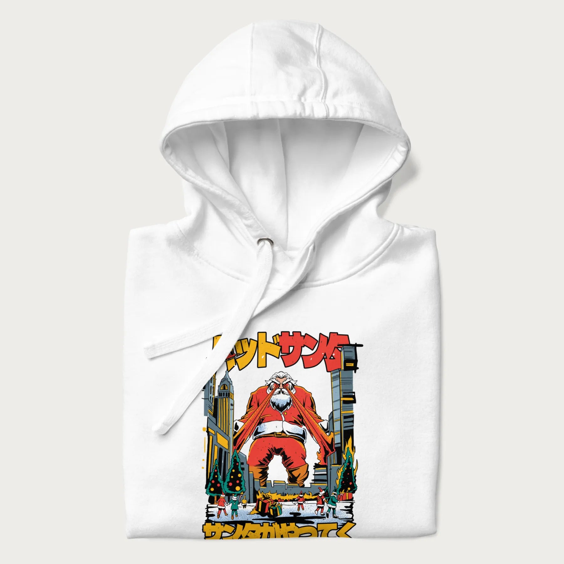Folded white hoodie with Japanese graphic of Santa Claus with laser eyes attacking a festive city, with the Japanese text 'パッドサンタ' (Bad Santa).
