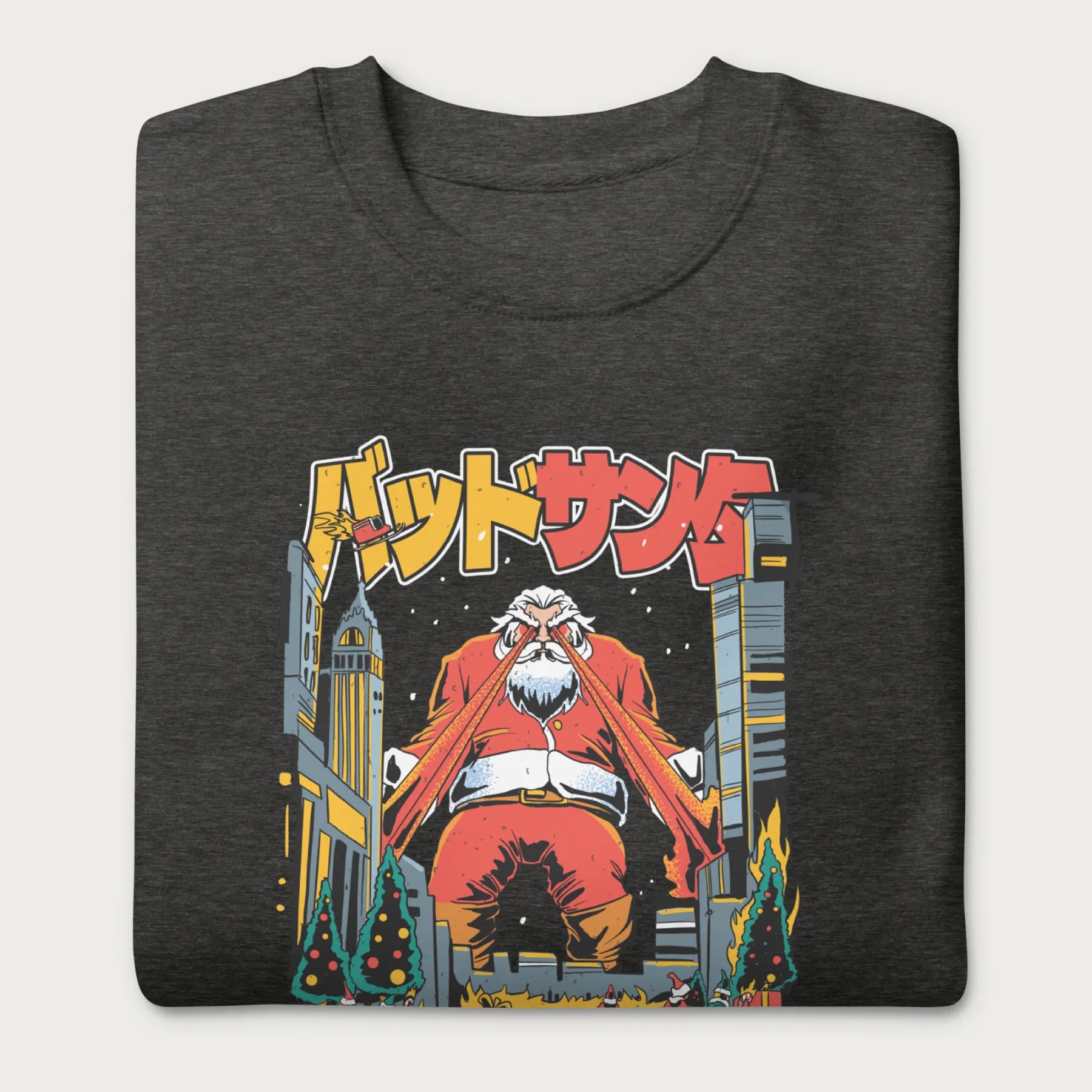Folded dark grey sweatshirt with a bold graphic of Santa Claus with laser eyes attacking a city, featuring bold Japanese text.