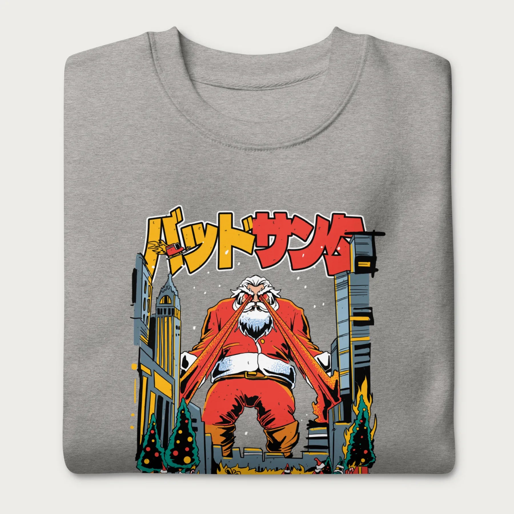 Folded light grey sweatshirt with a bold graphic of Santa Claus with laser eyes attacking a city, featuring bold Japanese text.