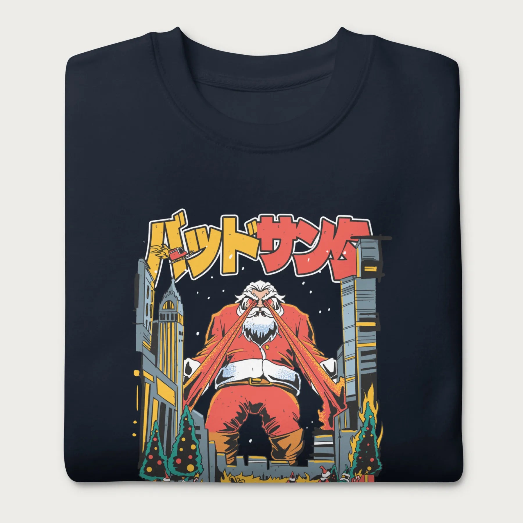Folded navy blue sweatshirt with a bold graphic of Santa Claus with laser eyes attacking a city, featuring bold Japanese text.