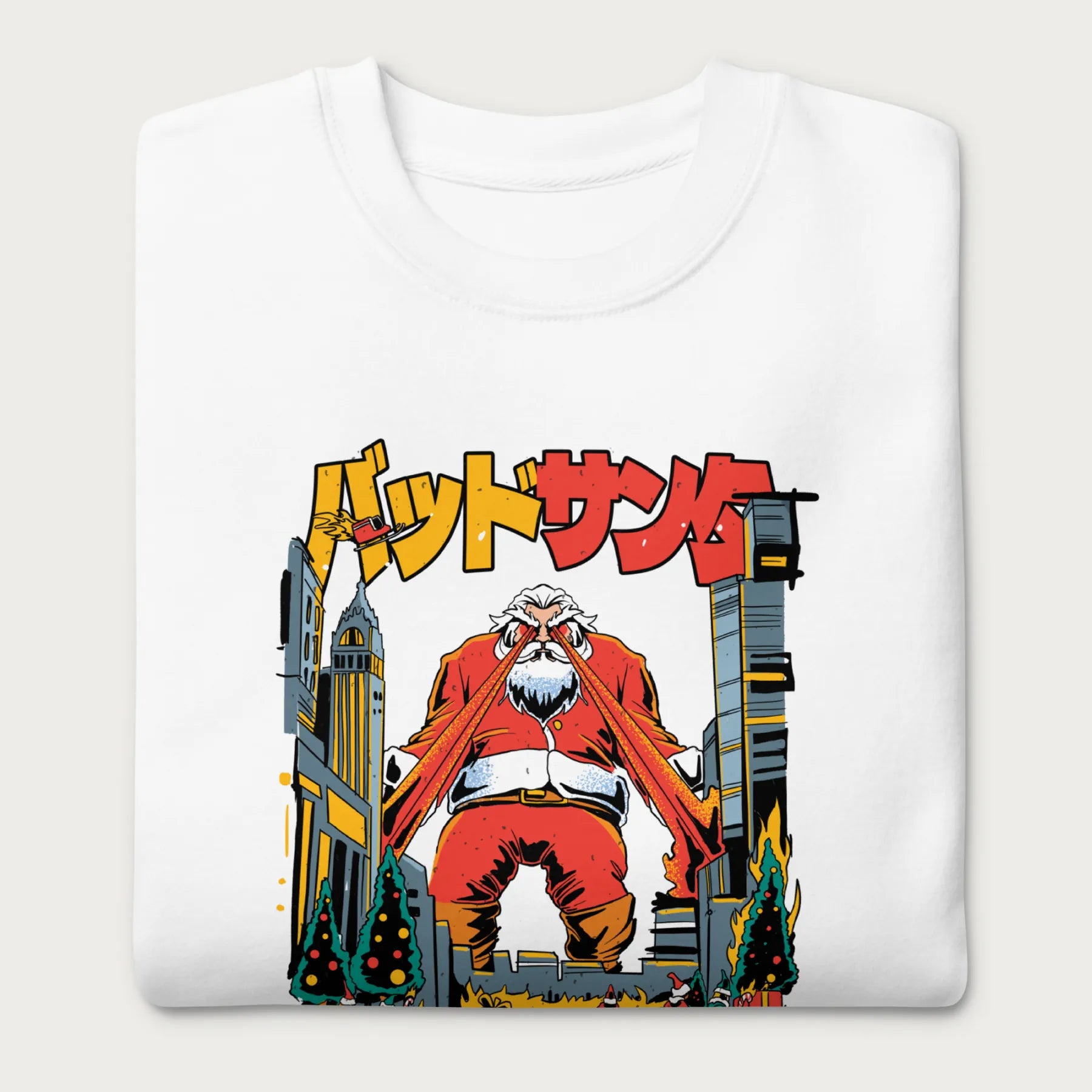 Folded white sweatshirt with a bold graphic of Santa Claus with laser eyes attacking a city, featuring bold Japanese text.