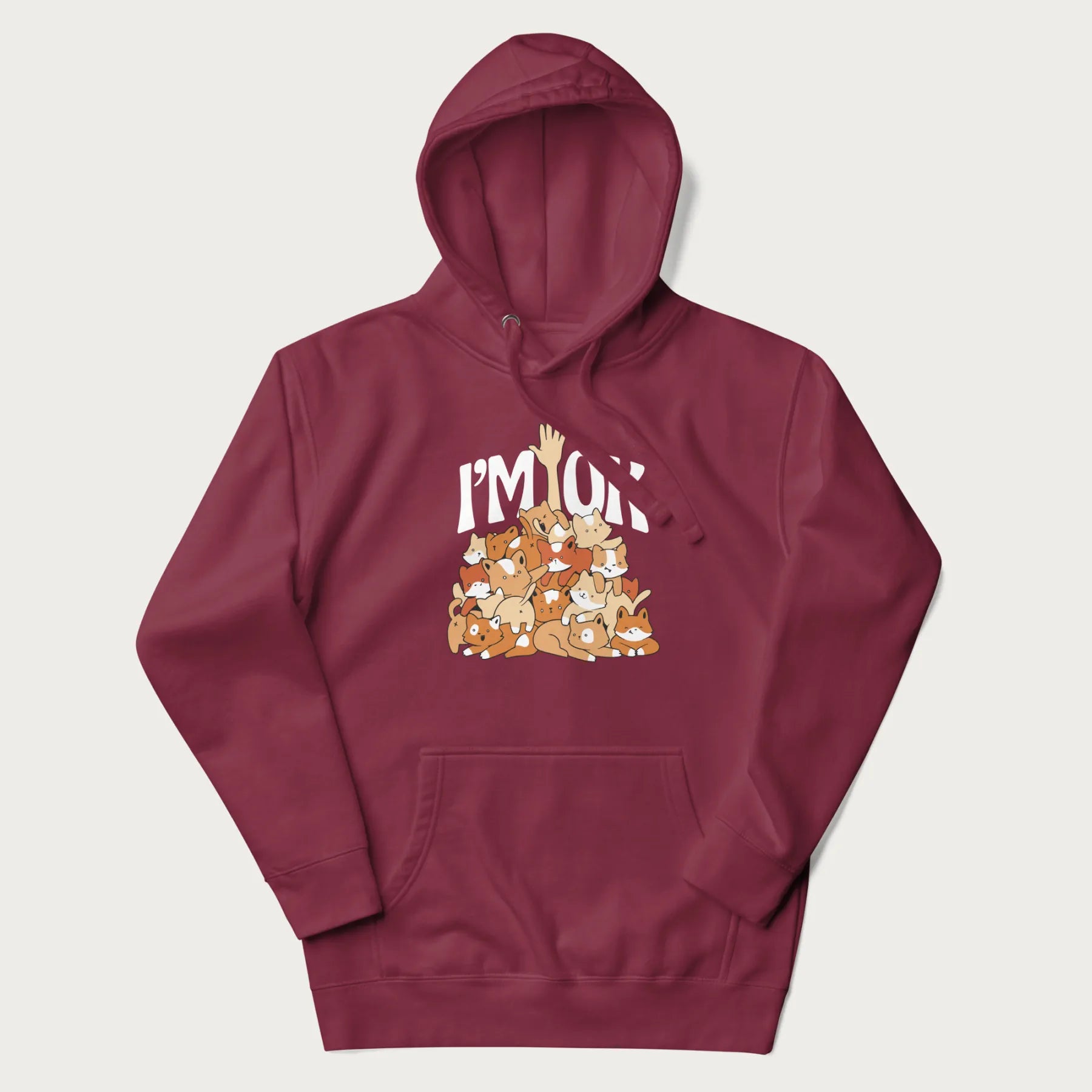 Maroon hoodie with a graphic of kittens piled on top of a person with "I'M OK" in large letters.