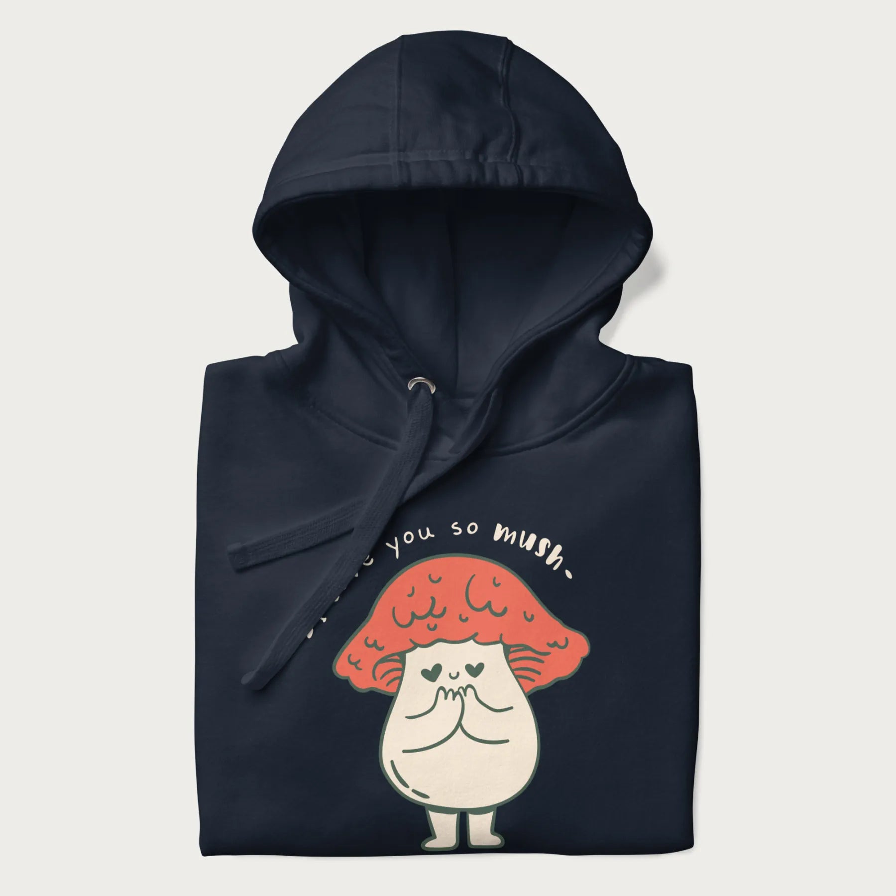 Folded navy blue hoodie with a graphic of a cute mushroom character with a red cap and heart-shaped eyes, and the text 'I Love You So Mush'.