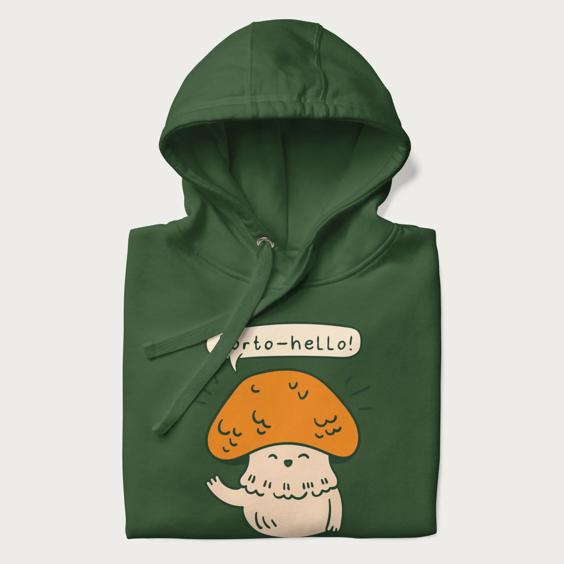 Folded forest green hoodie with a graphic of a cheerful mushroom character and the text 'Porto-hello!'.