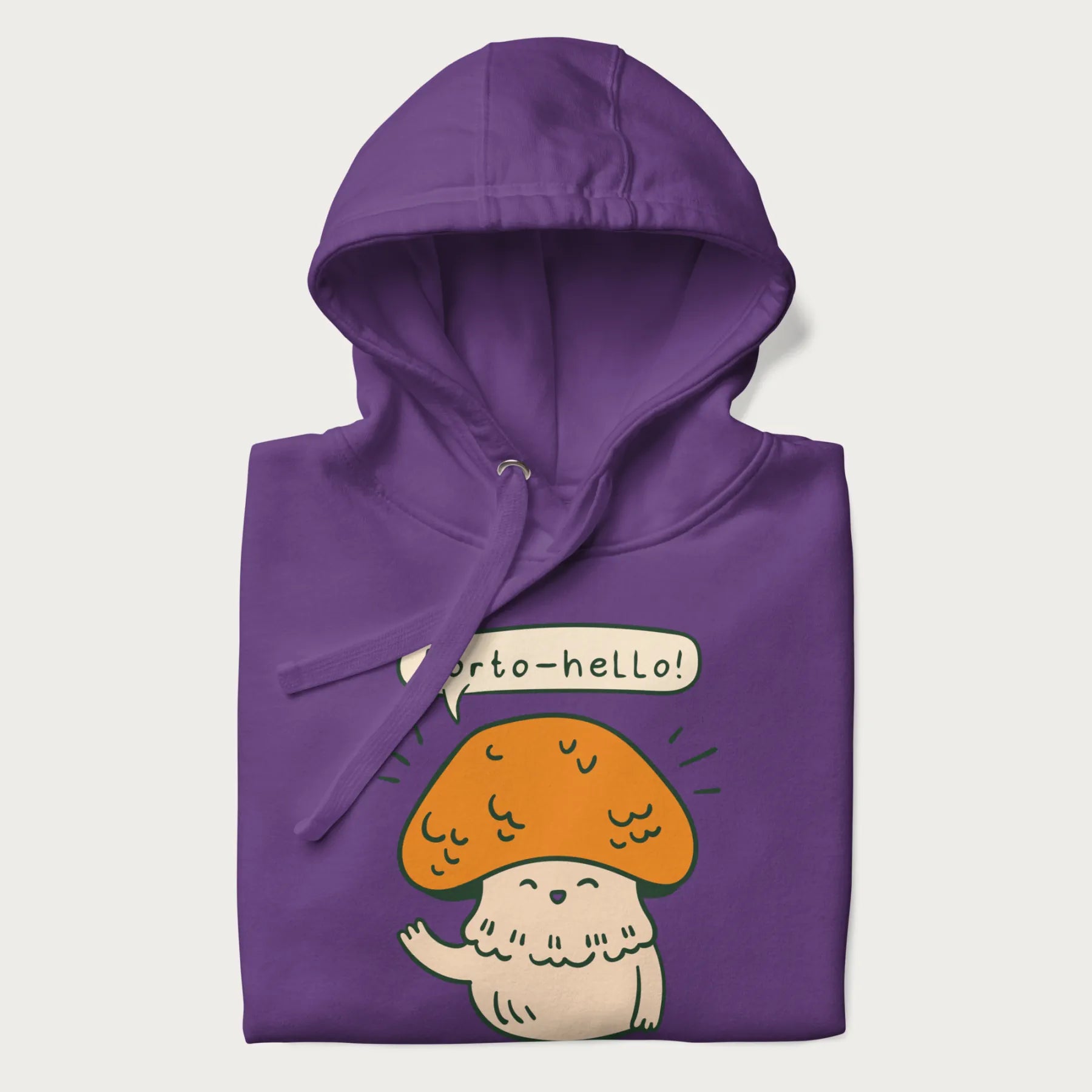 Folded purple hoodie with a graphic of a cheerful mushroom character and the text 'Porto-hello!'.