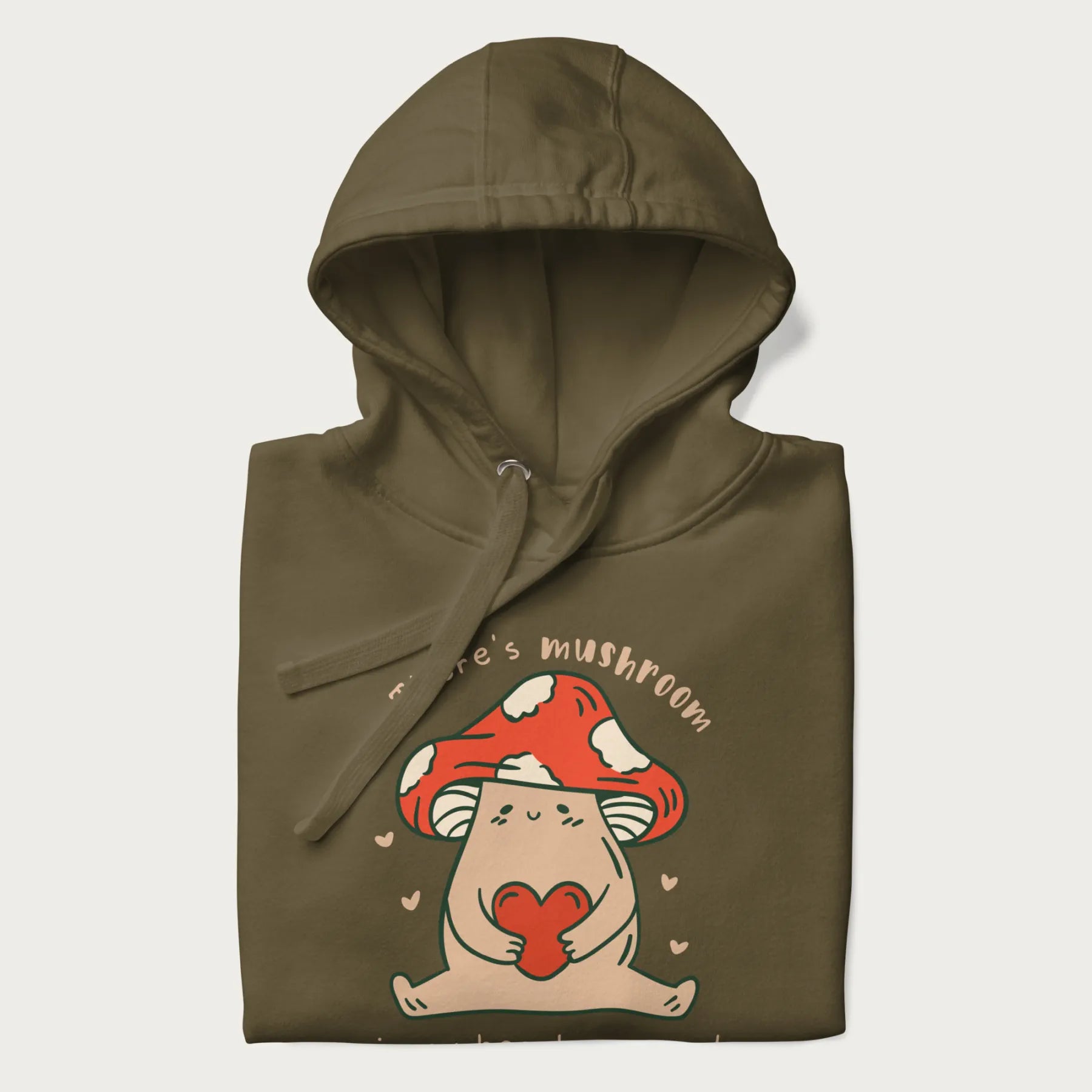 Folded military green hoodie with a graphic of a mushroom character holding a heart and the text 'There's Mushroom in My Heart for You'.