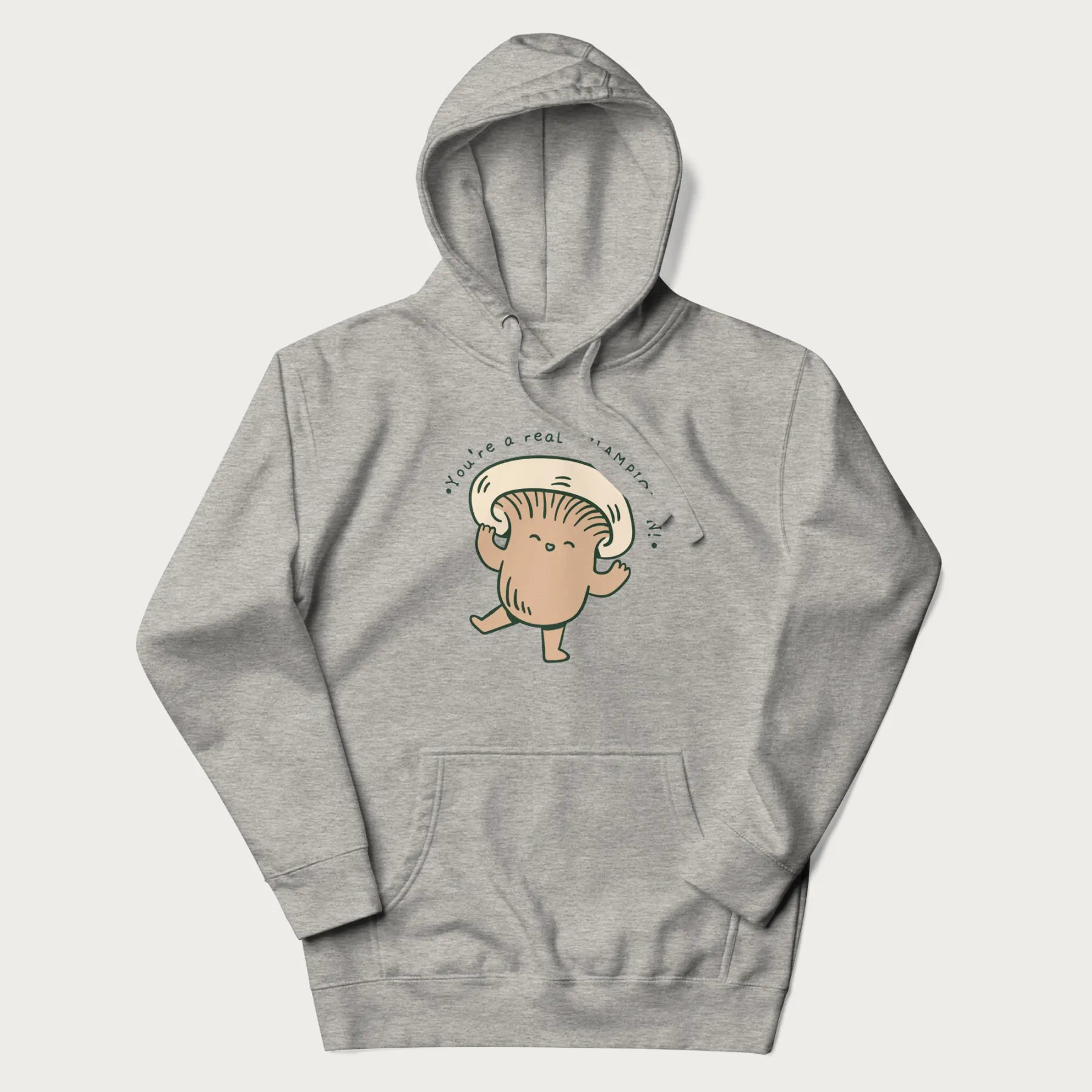 Light grey hoodie with a graphic of an adorable mushroom character and the text 'You're a real CHAMPIGNON!'.