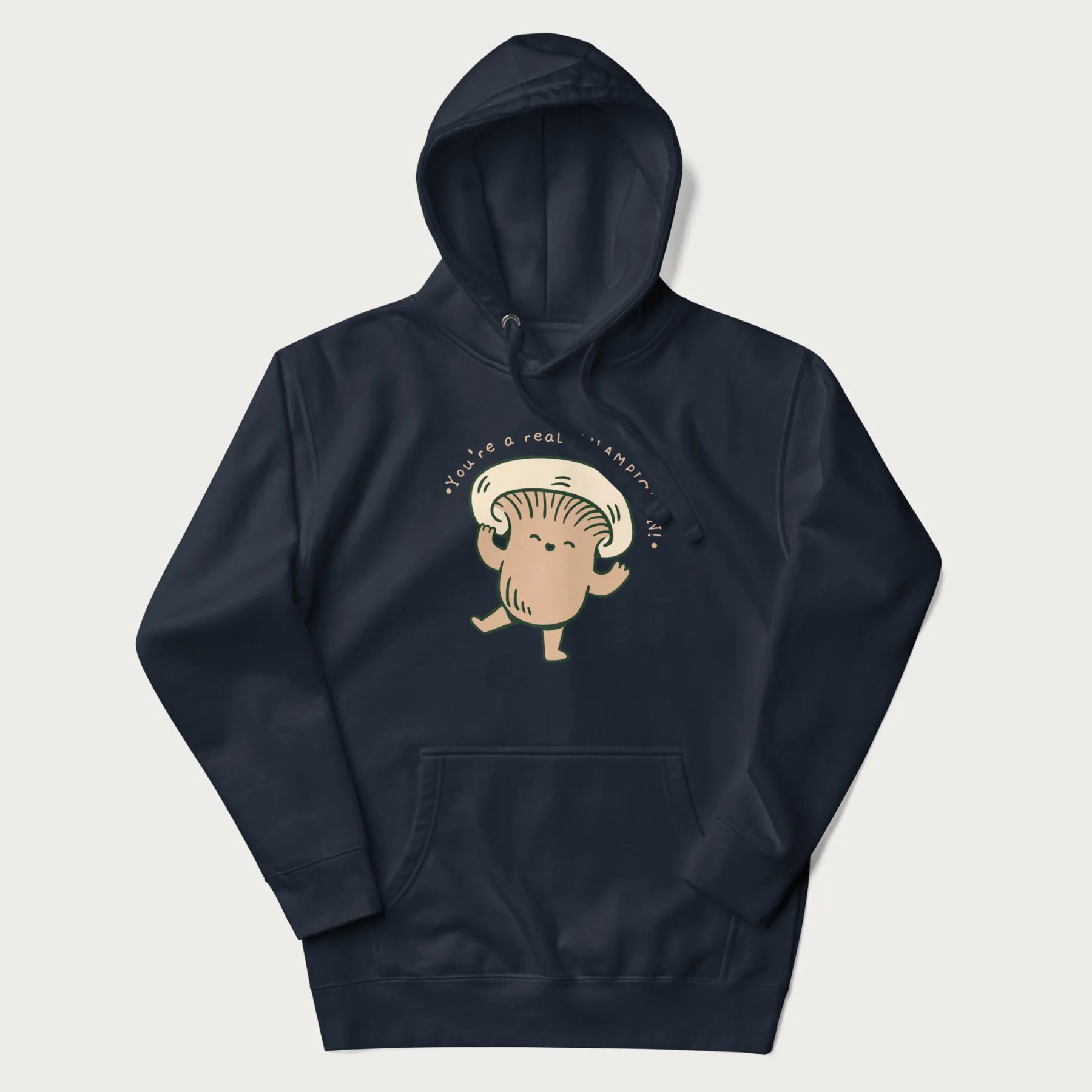 Navy blue hoodie with a graphic of an adorable mushroom character and the text 'You're a real CHAMPIGNON!'.