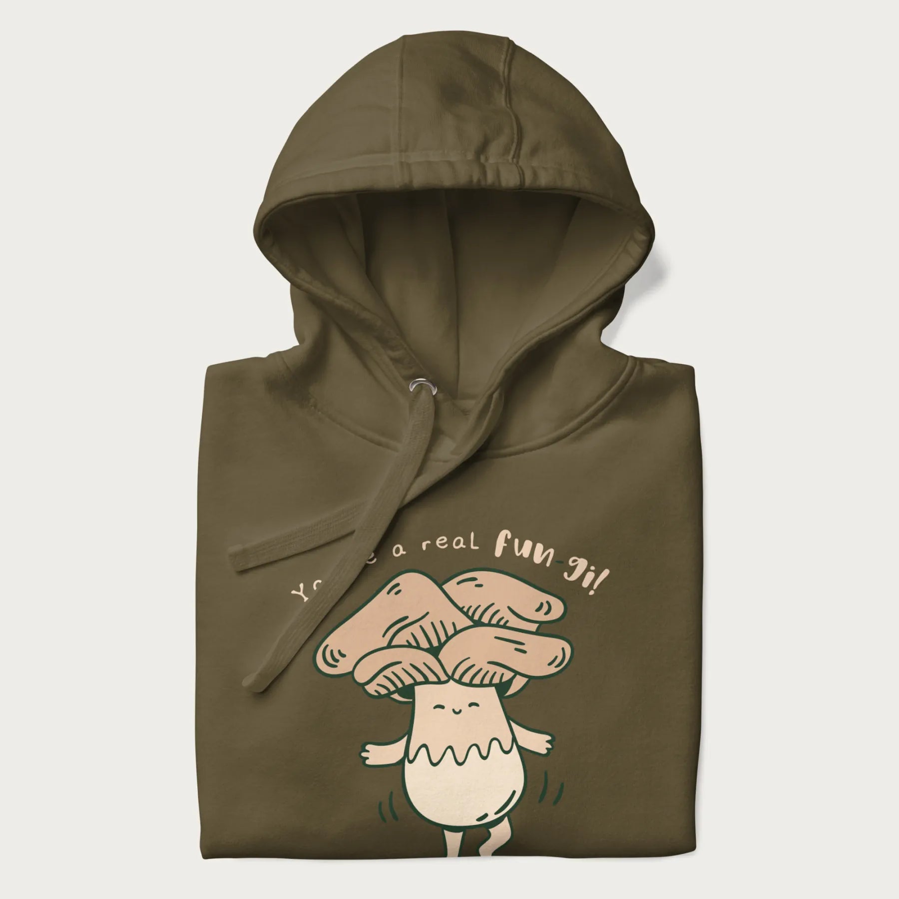 Folded military green hoodie with a graphic of a happy mushroom character and the text 'You're a real fun-gi!'.