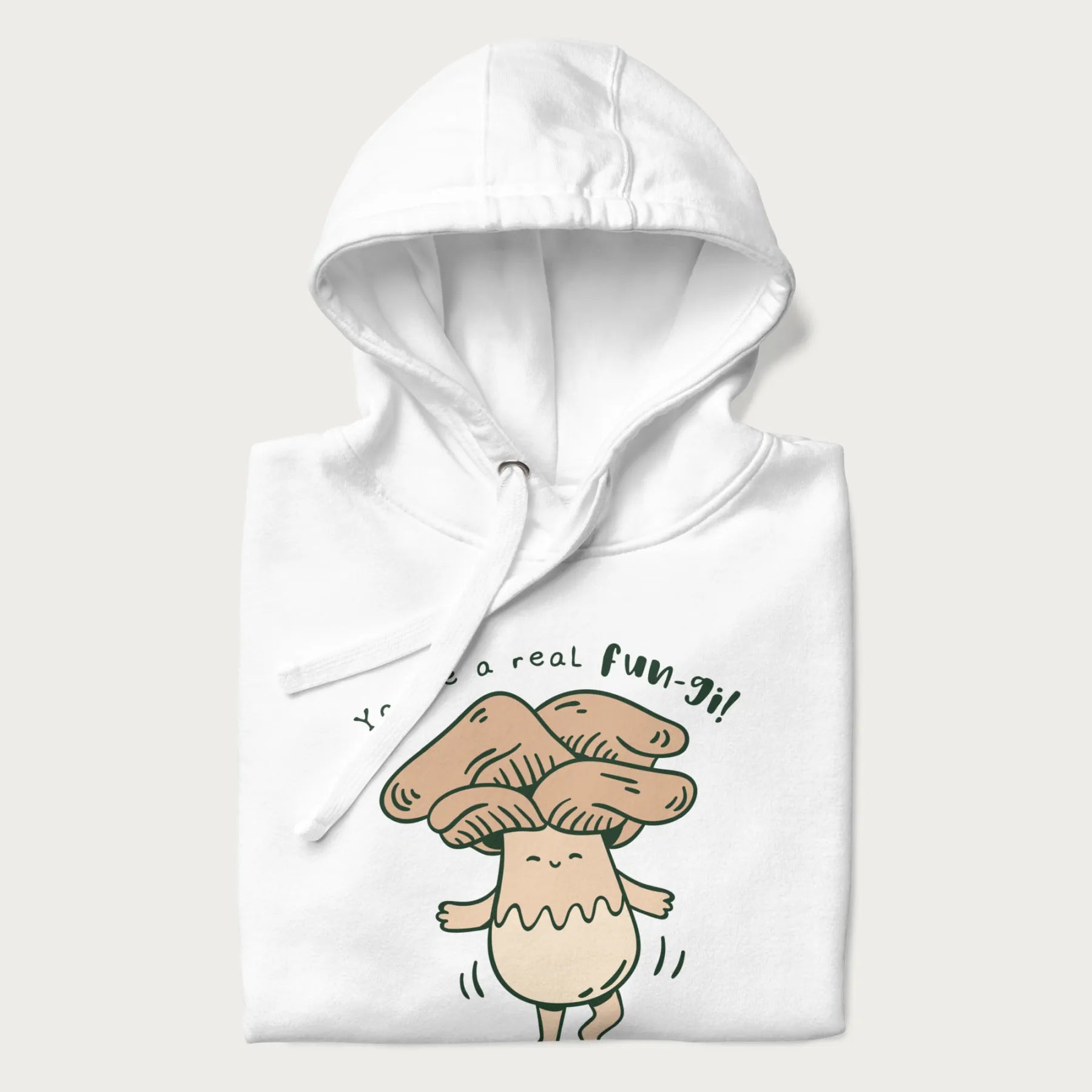 Folded white hoodie with a graphic of a happy mushroom character and the text 'You're a real fun-gi!'.