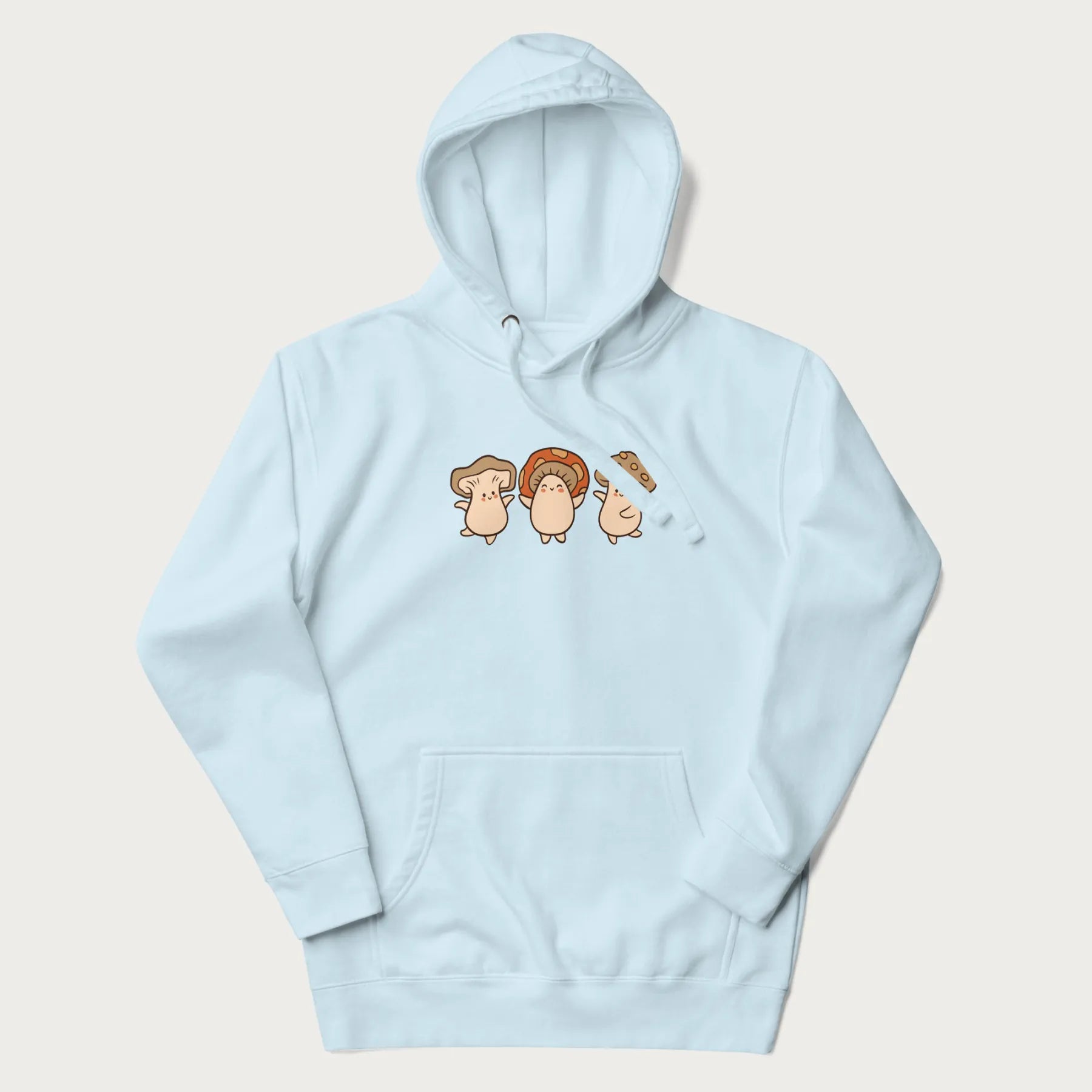 Light blue hoodie with a graphic illustration of three cheerful dancing mushrooms.
