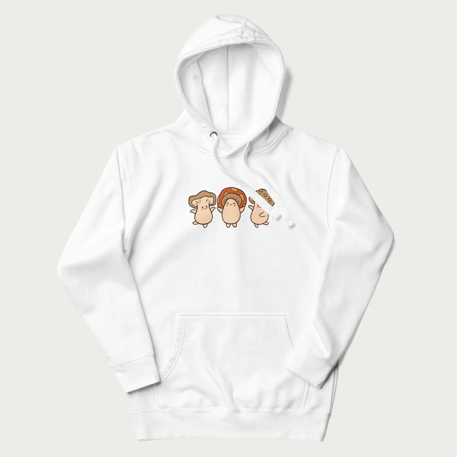 White hoodie with a graphic illustration of three cheerful dancing mushrooms.