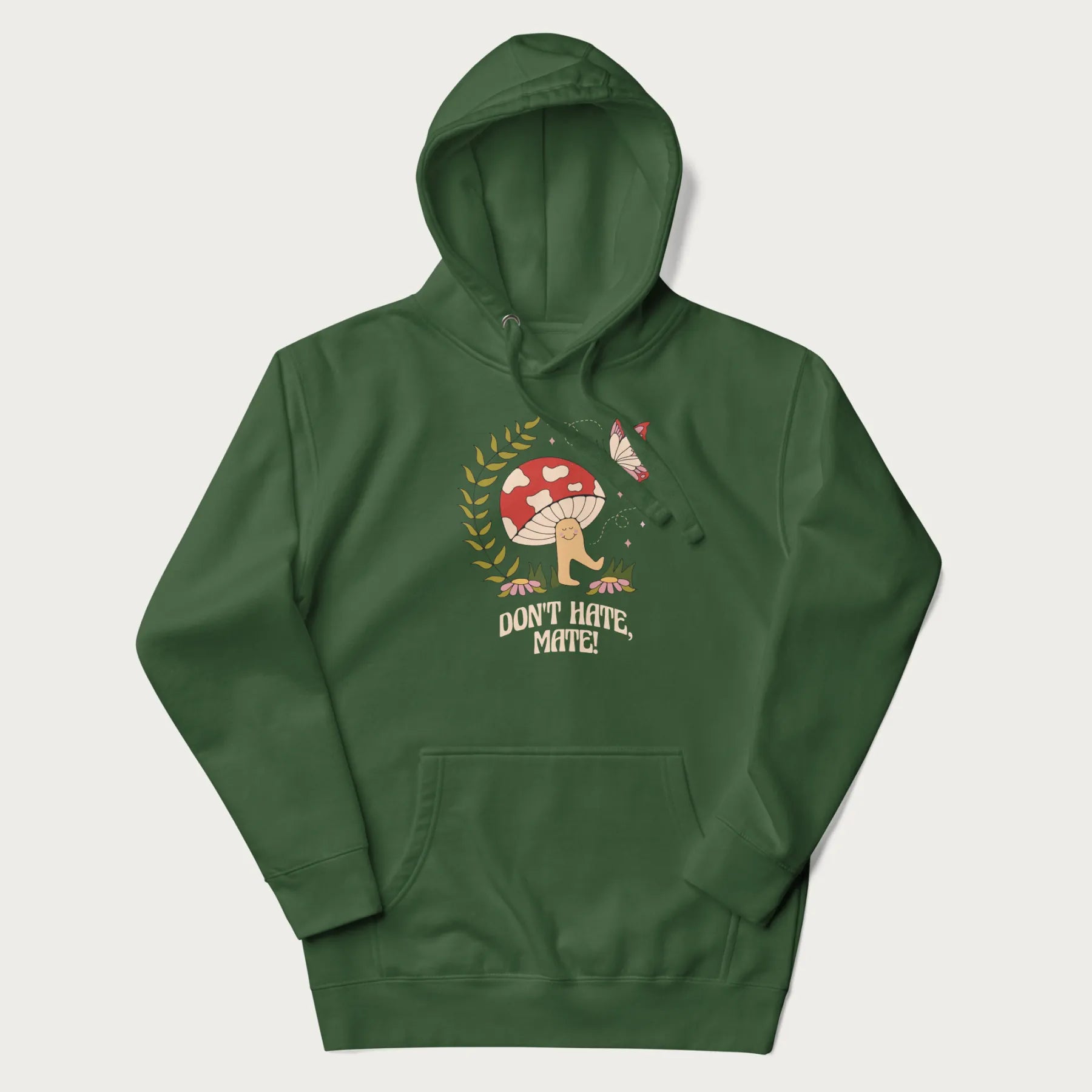 Forest green hoodie featuring a cute mushroom graphic with the text "Don't Hate, Mate."