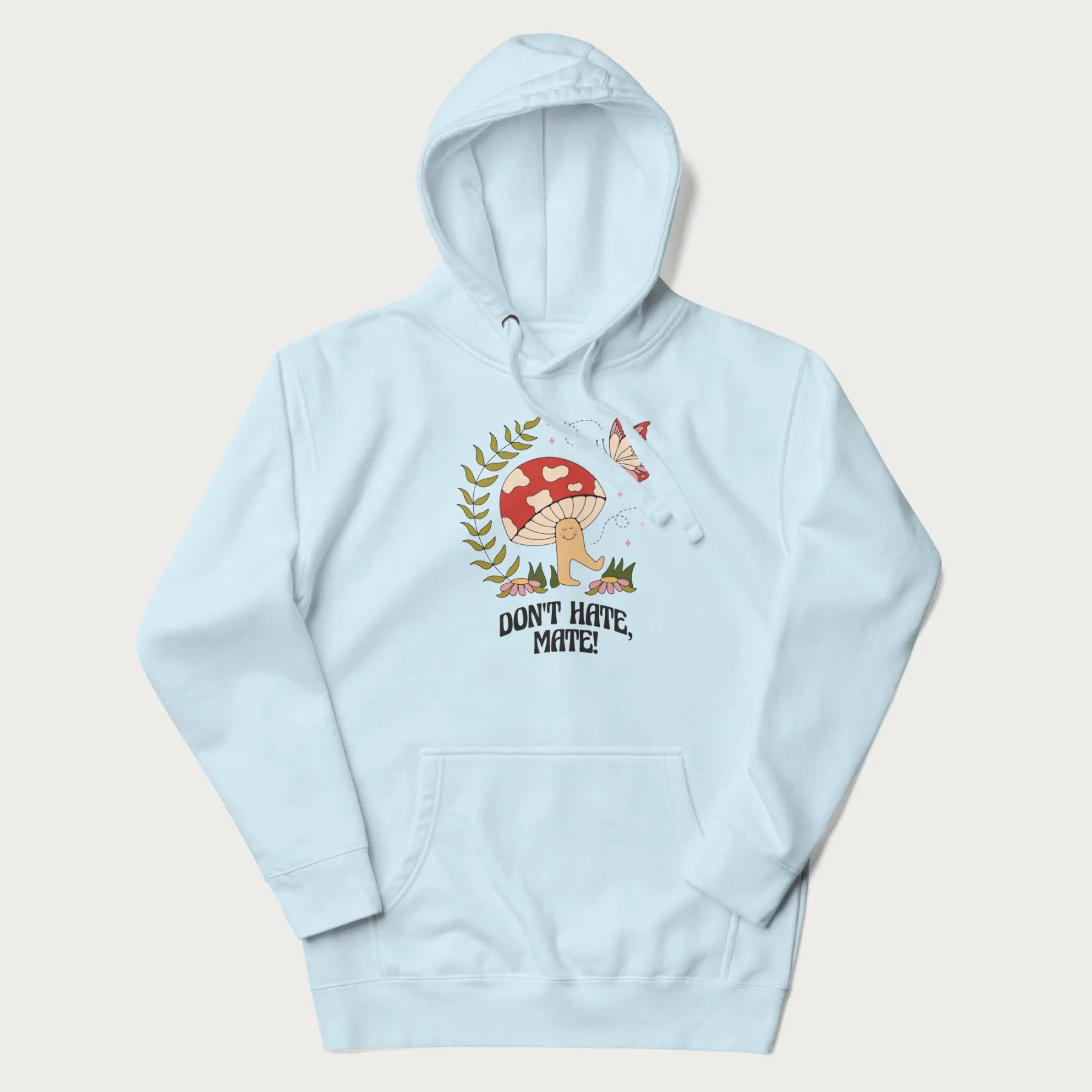 Light blue hoodie featuring a cute mushroom graphic with the text "Don't Hate, Mate."