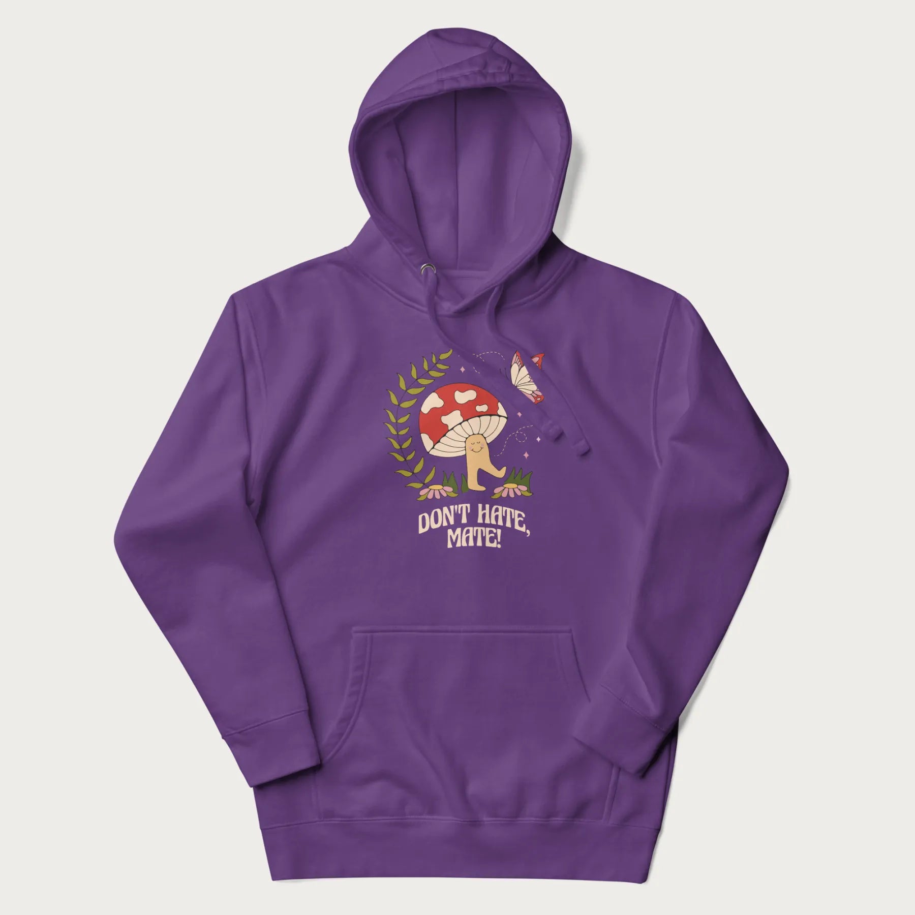 Purple hoodie featuring a cute mushroom graphic with the text "Don't Hate, Mate."