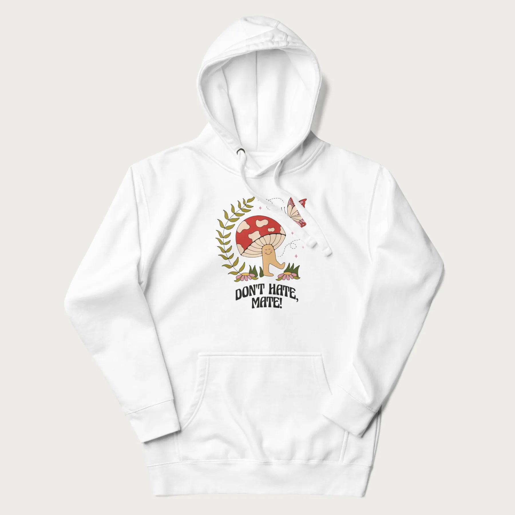 White hoodie featuring a cute mushroom graphic with the text "Don't Hate, Mate."