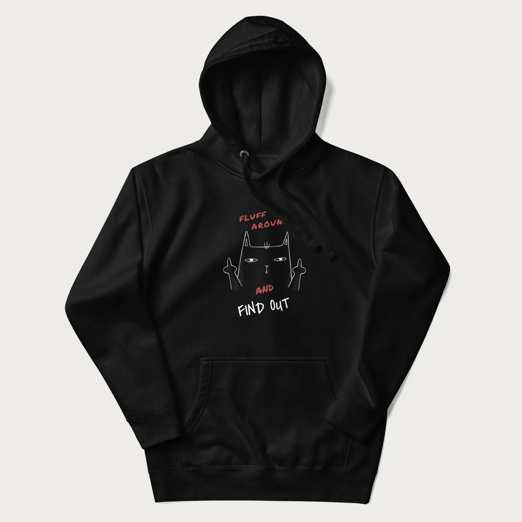 Black hoodie with a graphic of a cat raising its middle fingers and the text "FLUFF AROUND AND FIND OUT" in red.