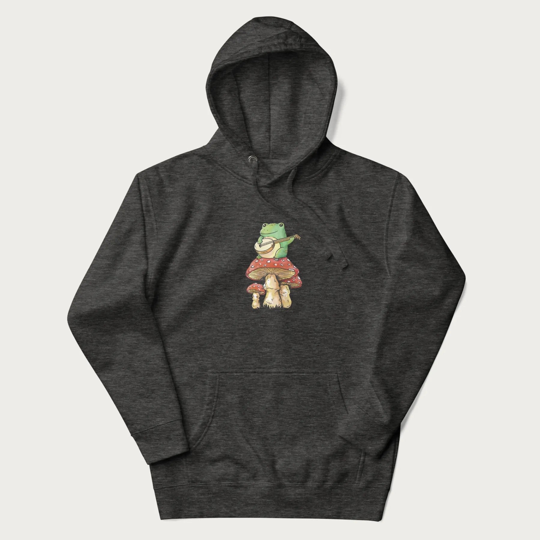 Dark grey hoodie featuring a graphic of a frog playing a banjo on top of red mushrooms.