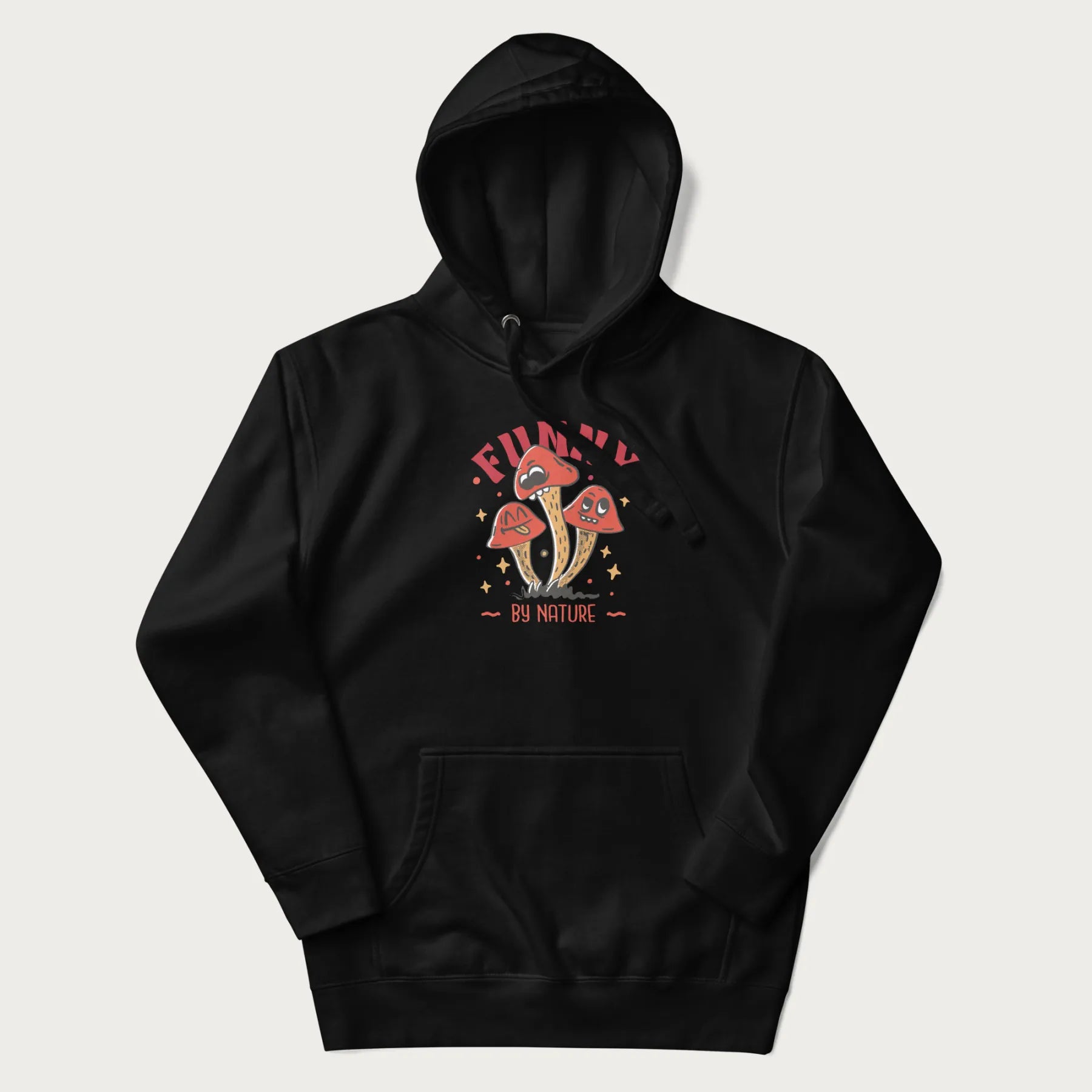 Black hoodie featuring a playful graphic of three mushrooms with expressive faces and the text "Funny by Nature."