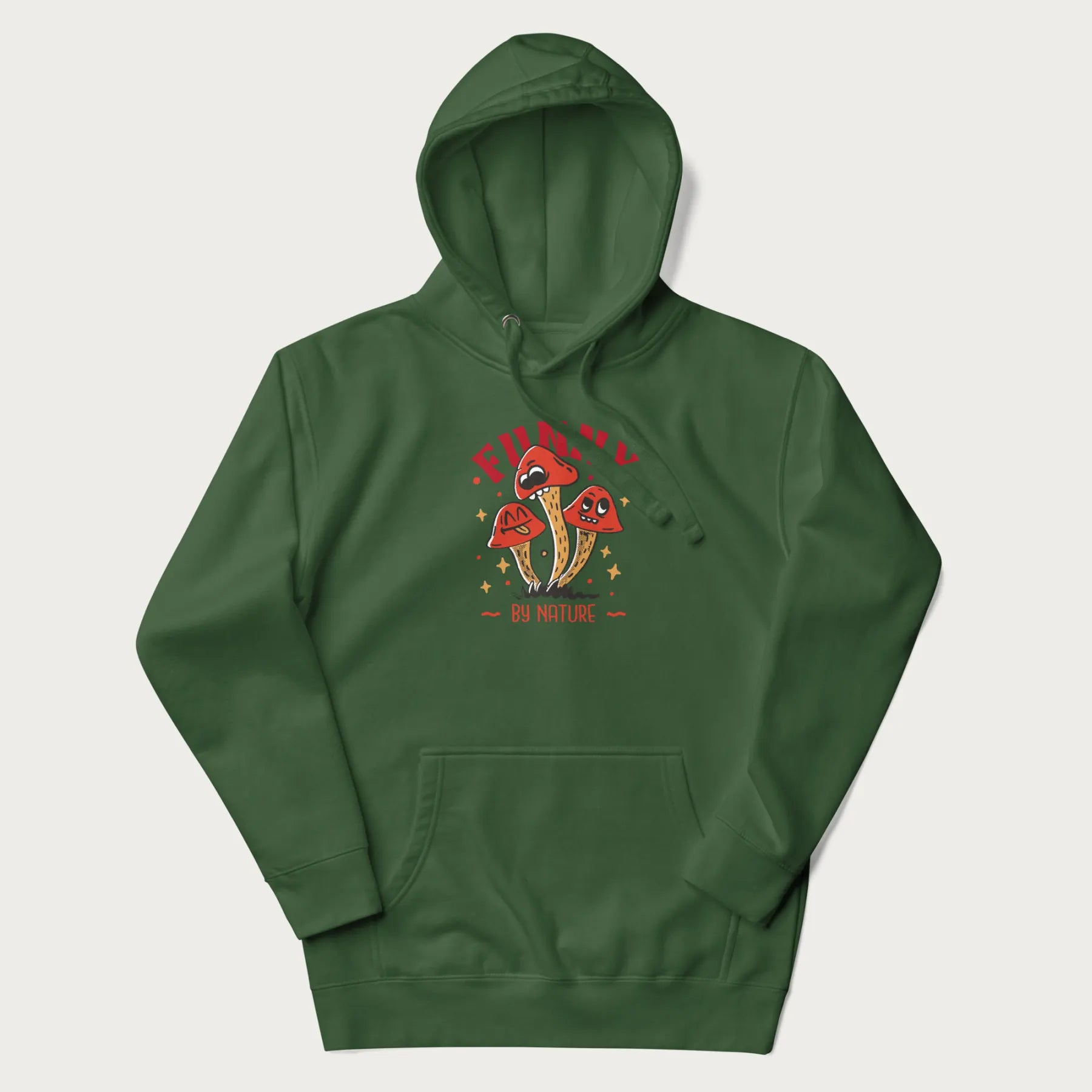 Forest green hoodie featuring a playful graphic of three mushrooms with expressive faces and the text "Funny by Nature."