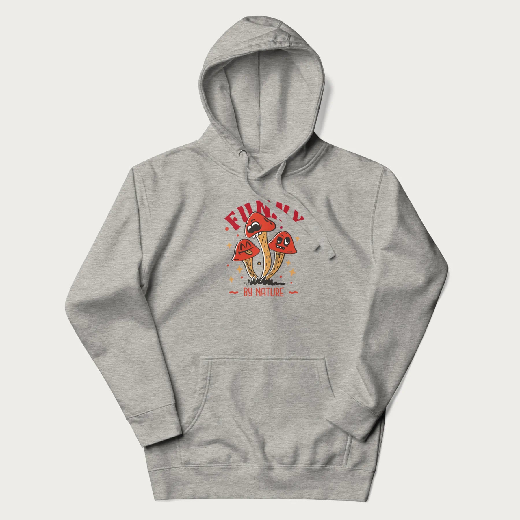 Light grey hoodie featuring a playful graphic of three mushrooms with expressive faces and the text "Funny by Nature."