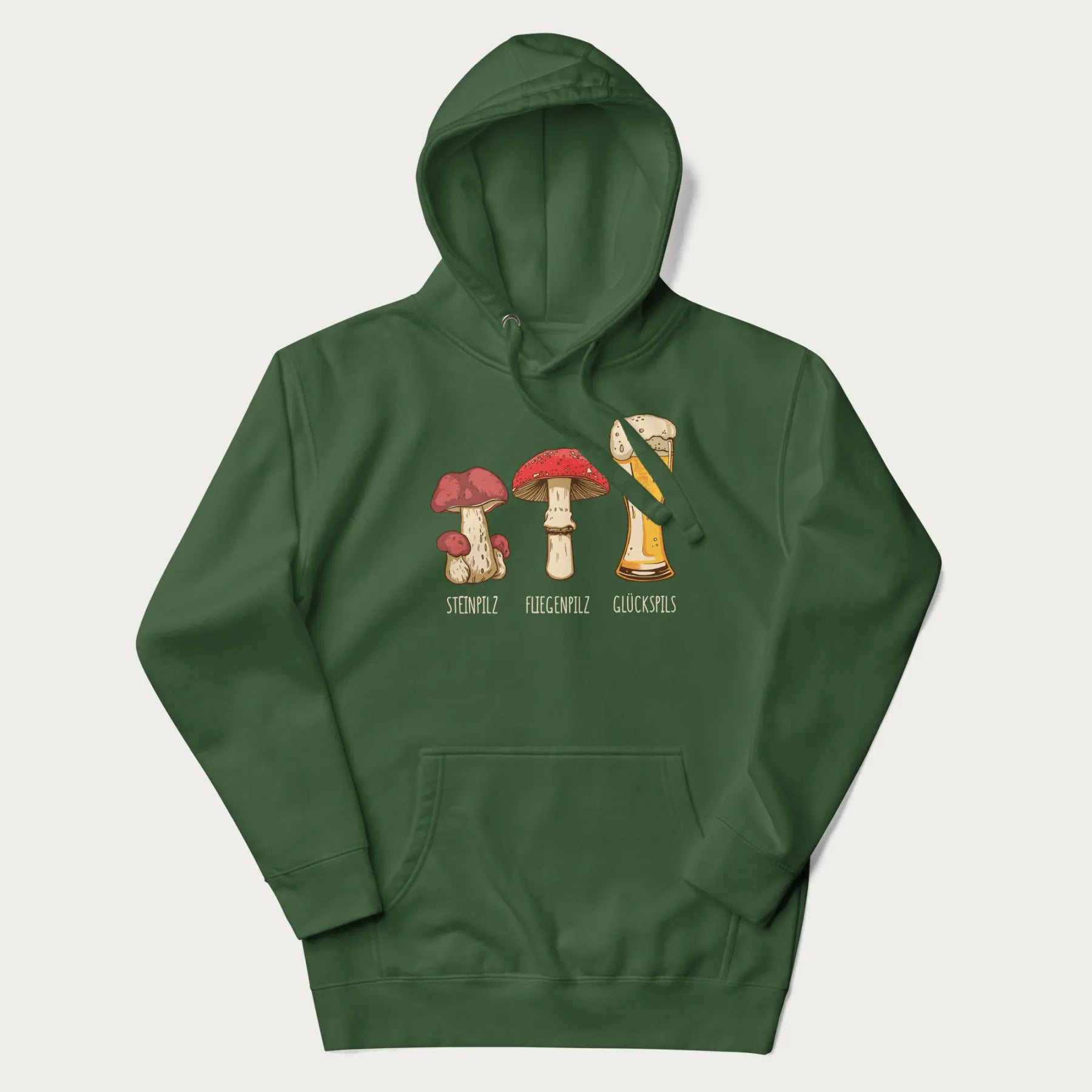 Forest green hoodie with illustrations of a Steinpilz, Fliegenpilz, and a beer glass labeled Glückspils.