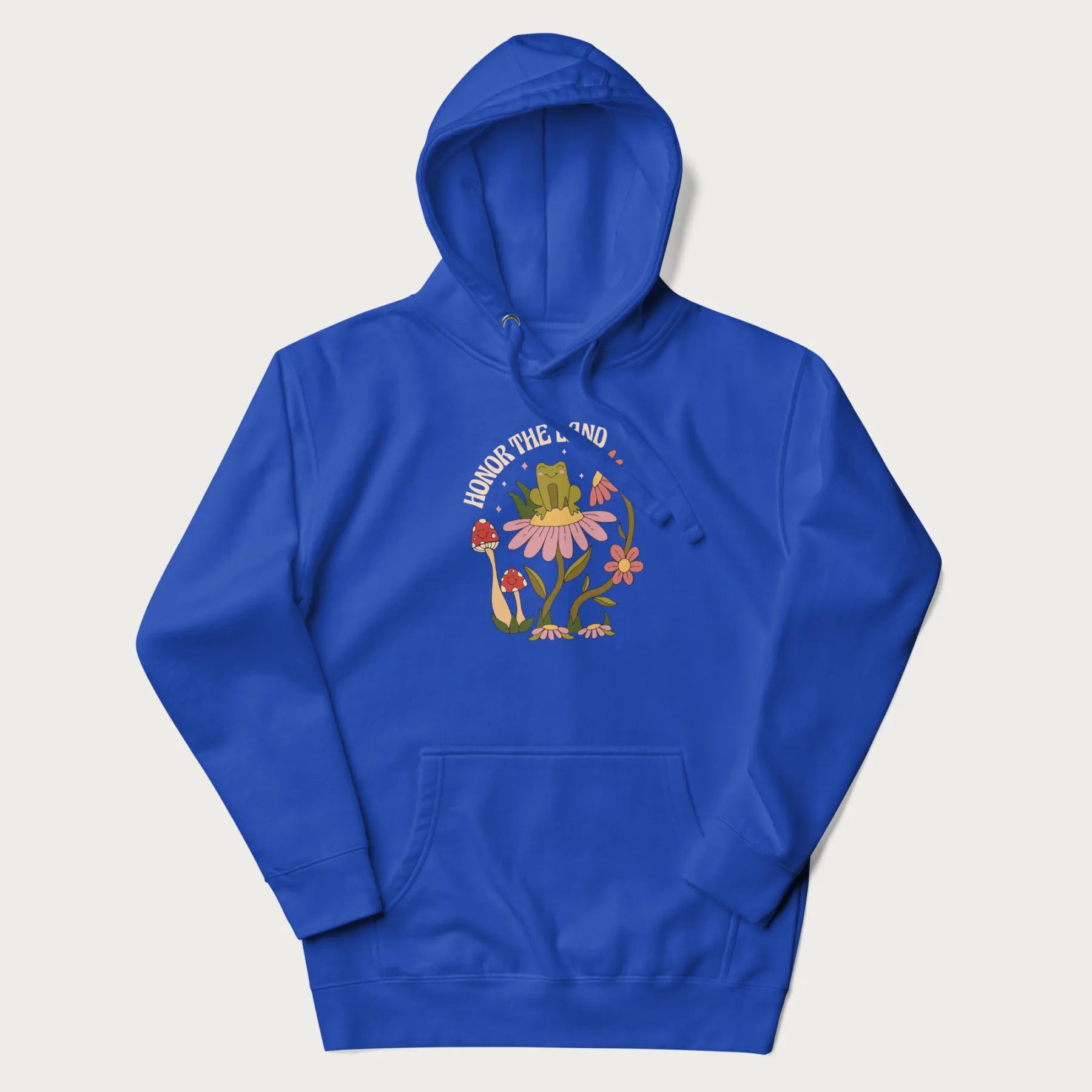 Royal blue hoodie with a graphic of a frog sitting on a flower, surrounded by mushrooms and flowers, with the text 'Honor the Land'.