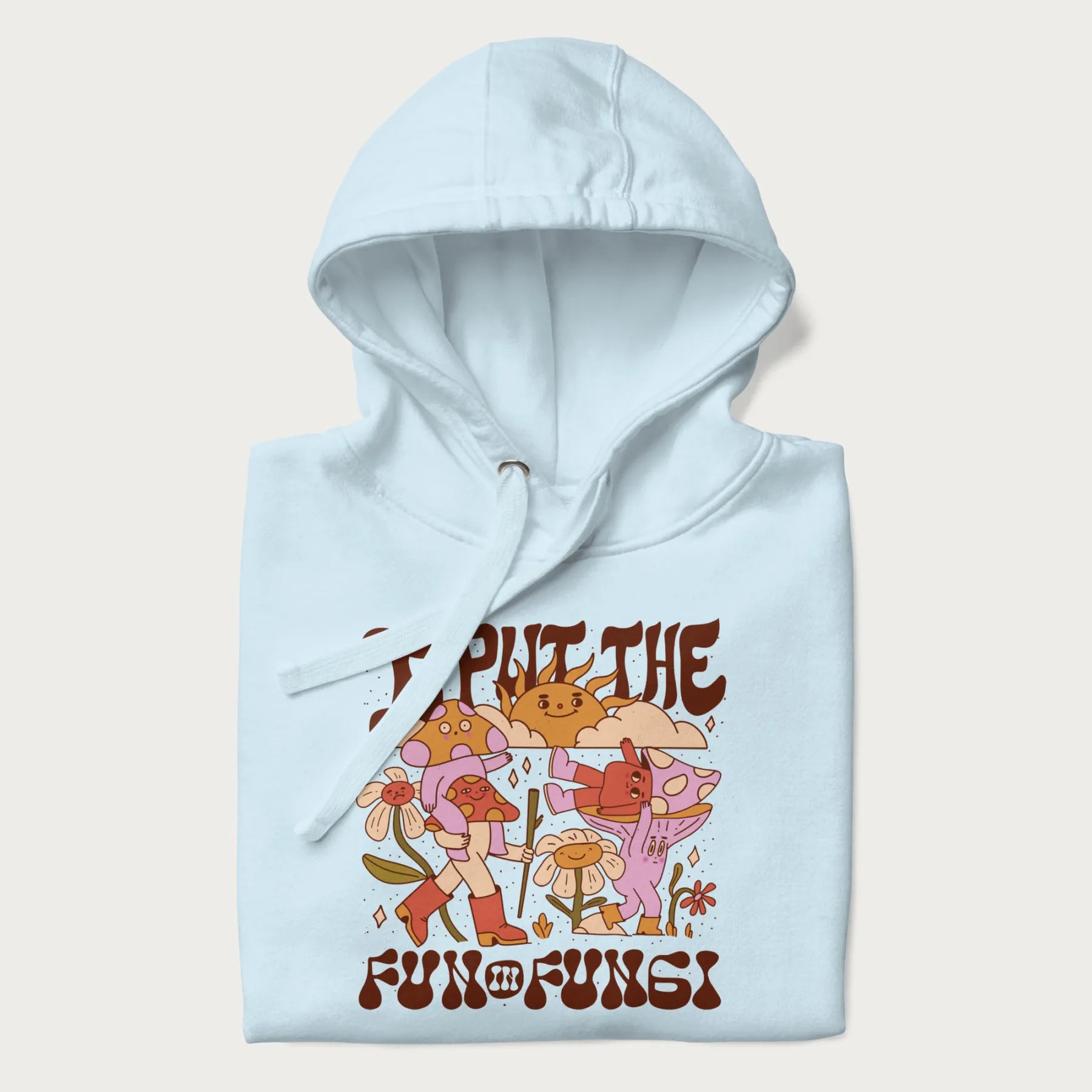 Folded light blue hoodie with a graphic of cheerful mushroom characters and the text 'I Put the Fun in Fungi'.