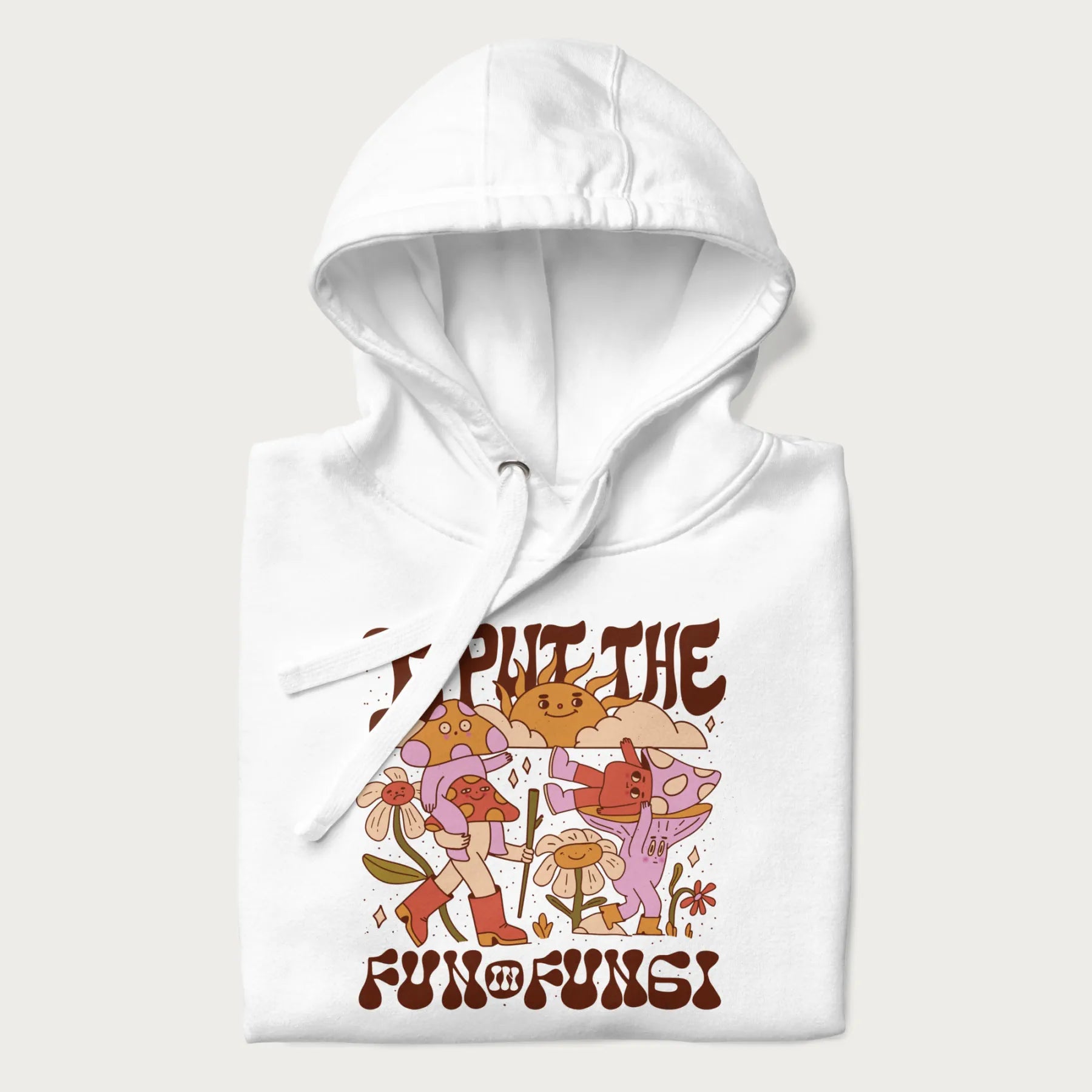 Folded white hoodie with a graphic of cheerful mushroom characters and the text 'I Put the Fun in Fungi'.