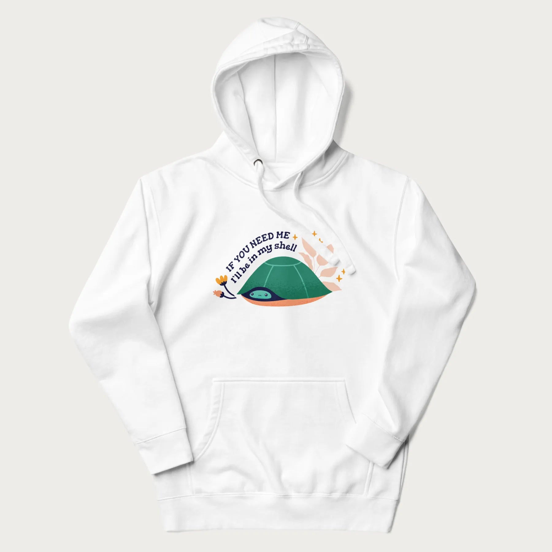 White hoodie with a graphic of a turtle peeking out from its shell and the text 'If You Need Me I'll be in my shell'.