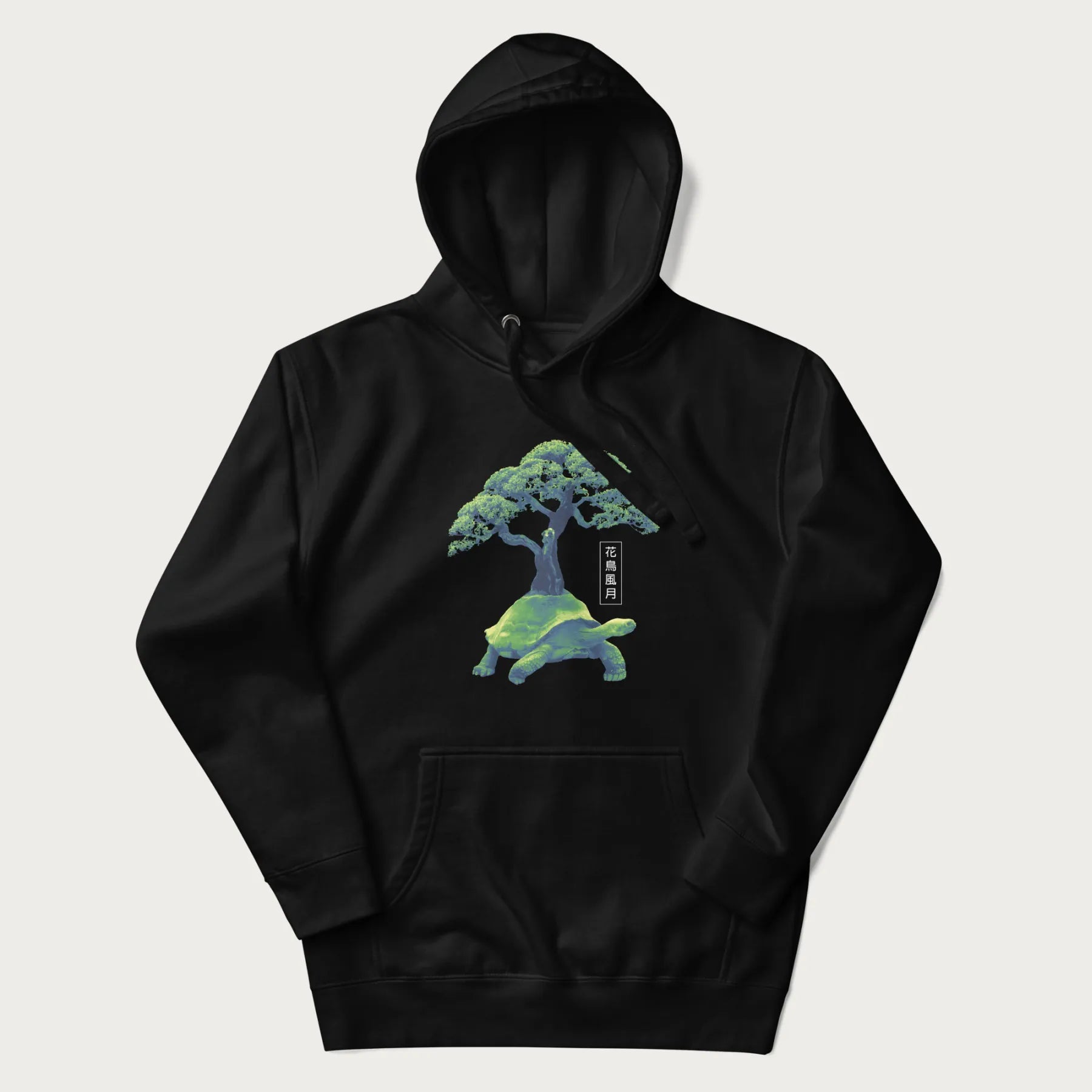 Black hoodie with a vibrant graphic of a turtle carrying a bonsai tree and Japanese text '花鳥風月.'