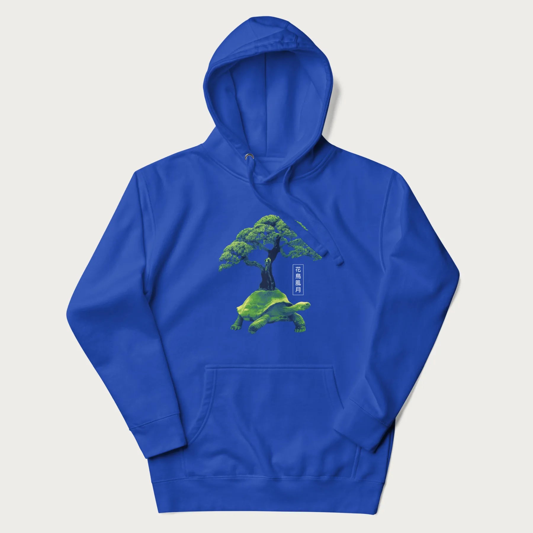 Royal blue hoodie with a vibrant graphic of a turtle carrying a bonsai tree and Japanese text '花鳥風月.'