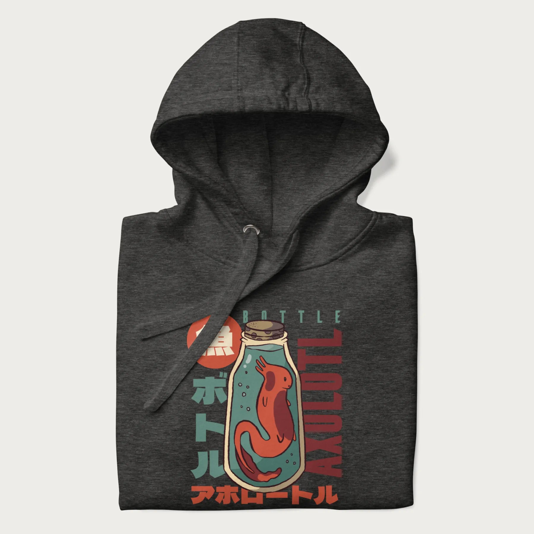 Folded dark grey hoodie with Japanese graphic of a red axolotl in a bottle with Japanese text 'ボトル' (Bottle) and 'アホロートル' (Axolotl).