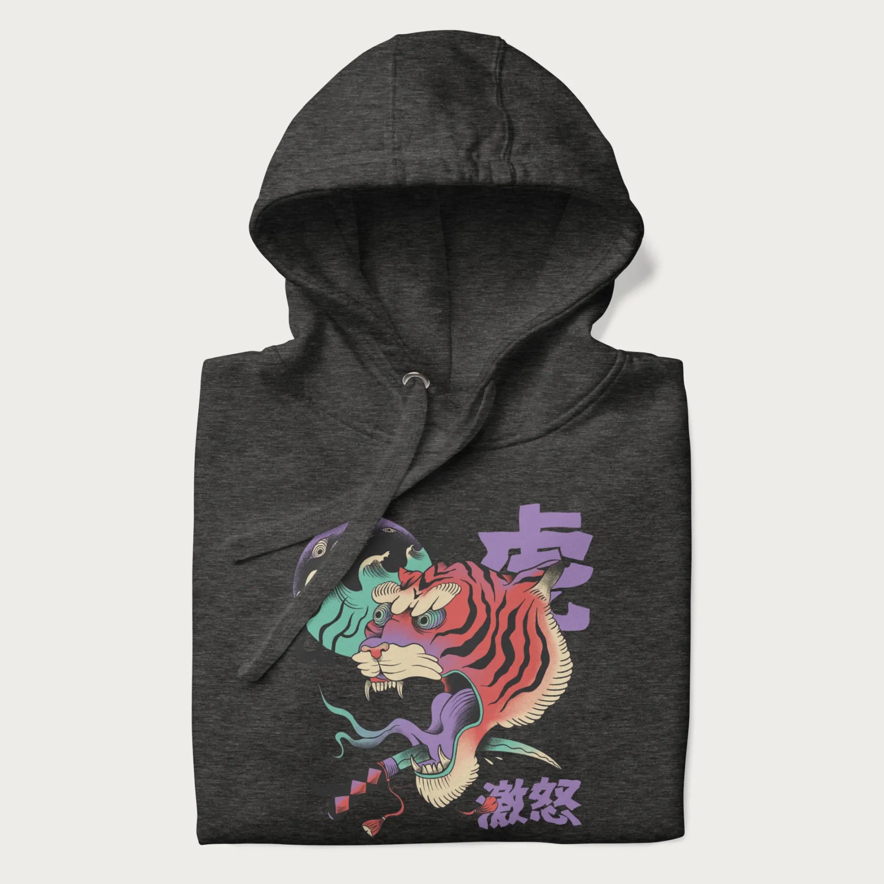 Folded dark grey hoodie with Japanese tiger graphic, rendered in vivid orange and purple, with Japanese text '虎' (Tiger) and '激怒' (Rage).