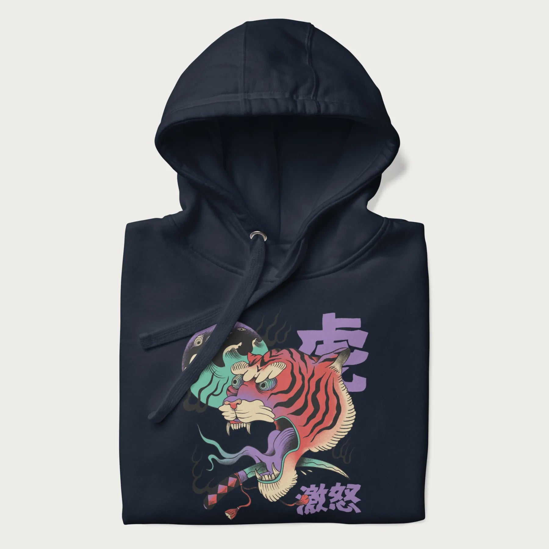 Folded navy blue hoodie with Japanese tiger graphic, rendered in vivid orange and purple, with Japanese text '虎' (Tiger) and '激怒' (Rage).