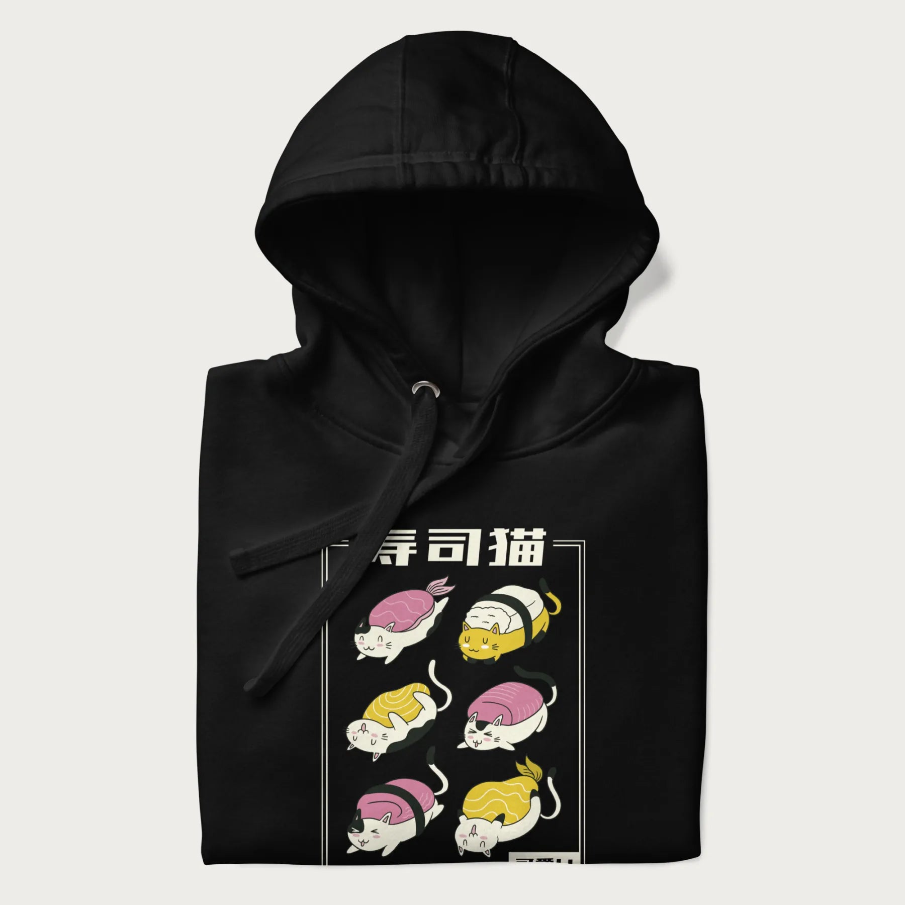 Folded black hoodie with a cute Japanese Sushi Cat design.