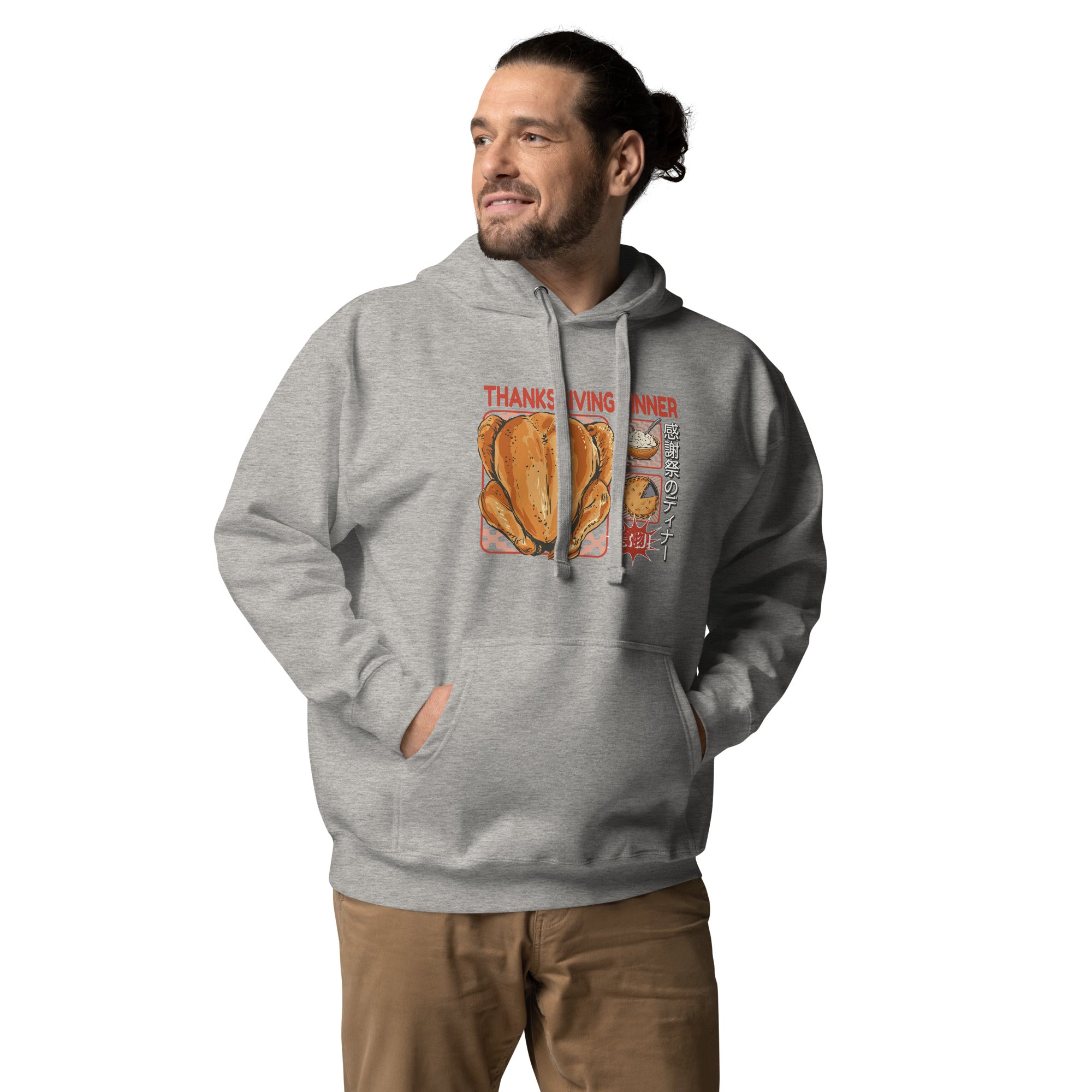 Man wearing a Japanese Thanksgiving hoodie in Carbon Grey colorway, featuring a graphic print of a roast chicken, Japanese potato salad, and an apple pie.