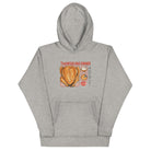 Front of Japanese Thanksgiving Hoodie in Carbon Grey: The front view of a medium gray hoodie with a meticulously illustrated Japanese Thanksgiving graphic, featuring a roast chicken, Japanese potato salad, and an apple pie.