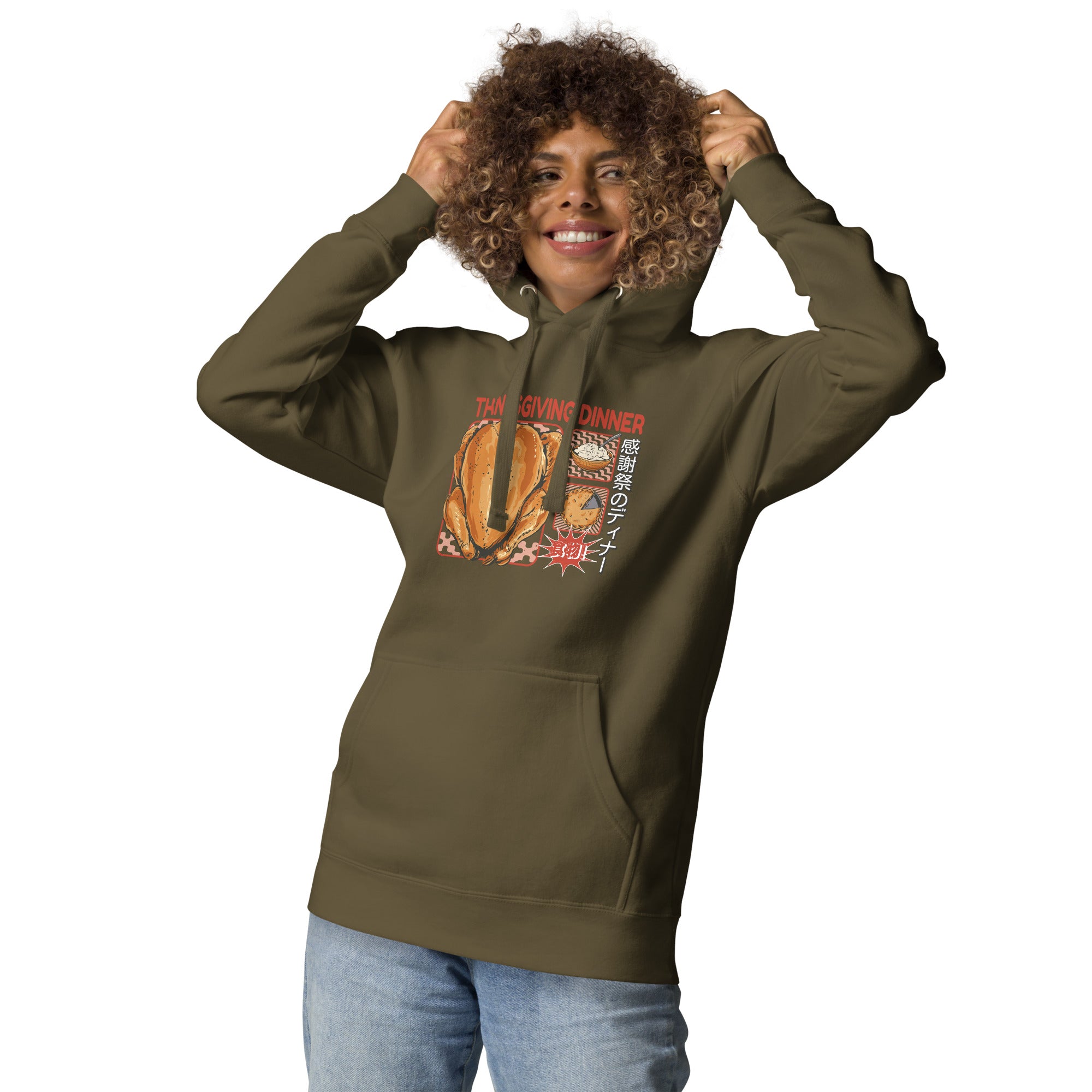 Woman wearing a Japanese Thanksgiving hoodie in Military Green colorway featuring a graphic print of roast chicken, Japanese potato salad, and an apple pie.