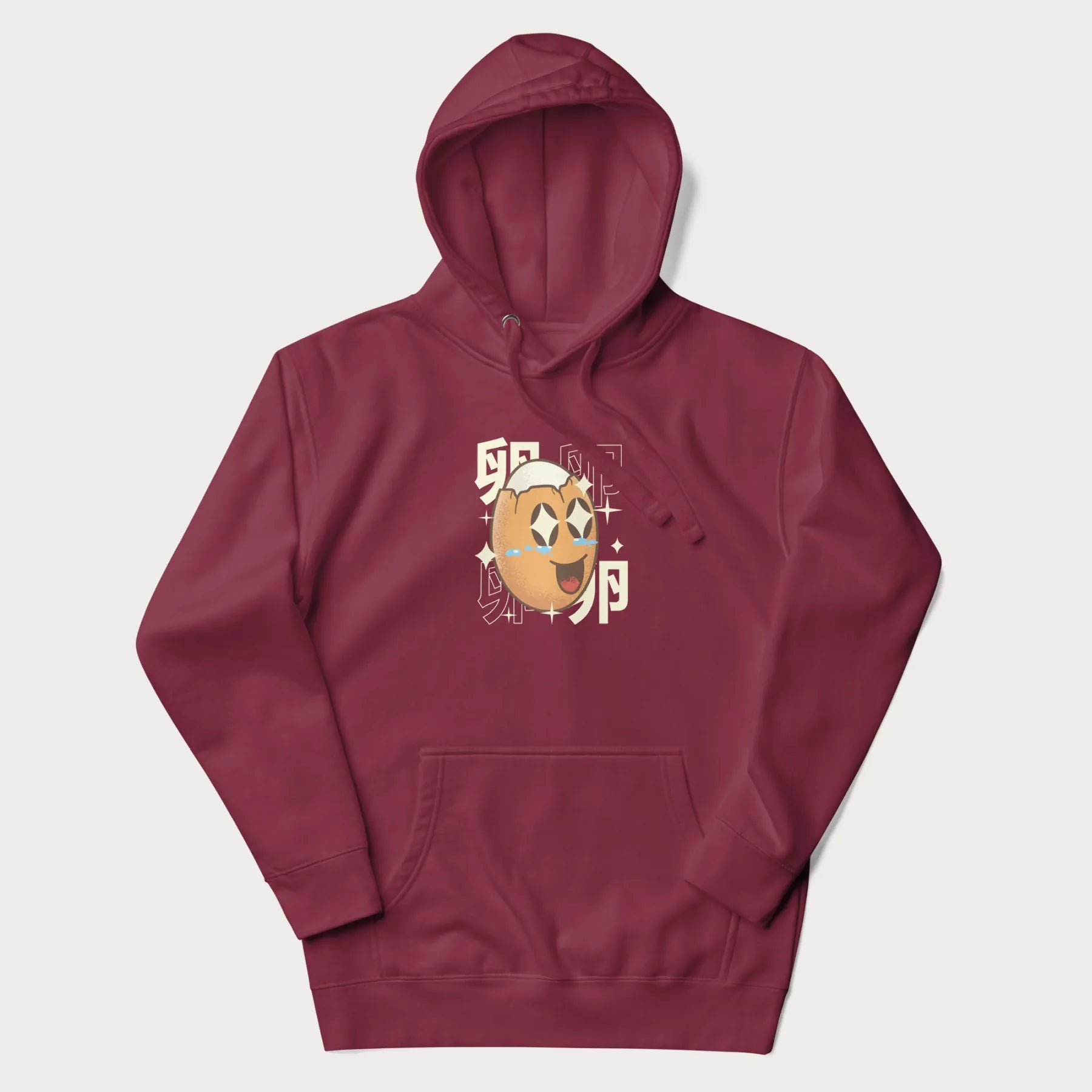 Maroon hoodie with Japanese graphic of a smiling egg with tears of joy, surrounded by the Japanese text '卵' (Egg).
