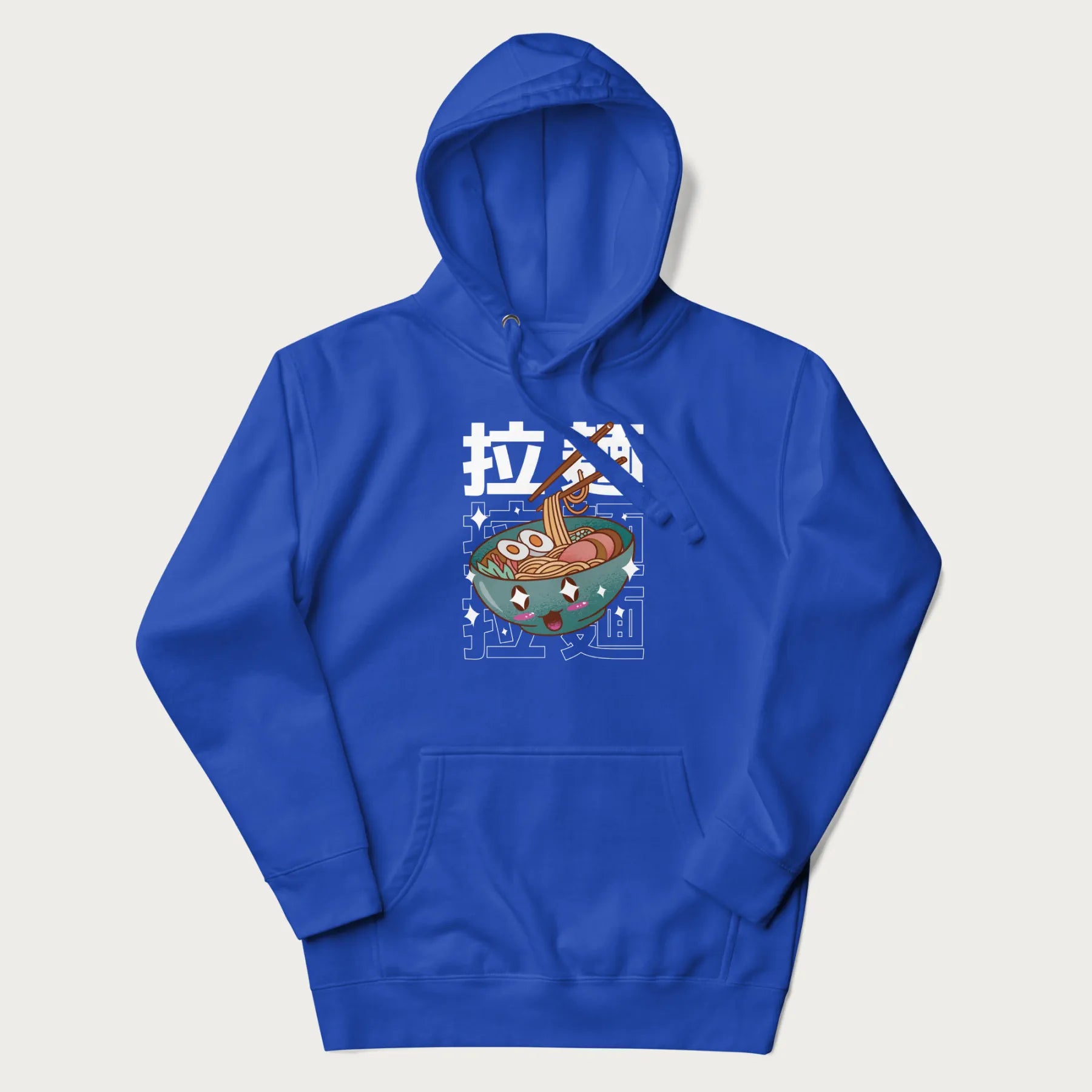 Royal blue hoodie with Japanese text '拉麵' (Ramen) and graphic of a kawaii ramen bowl with sparkling eyes and blushed cheeks.