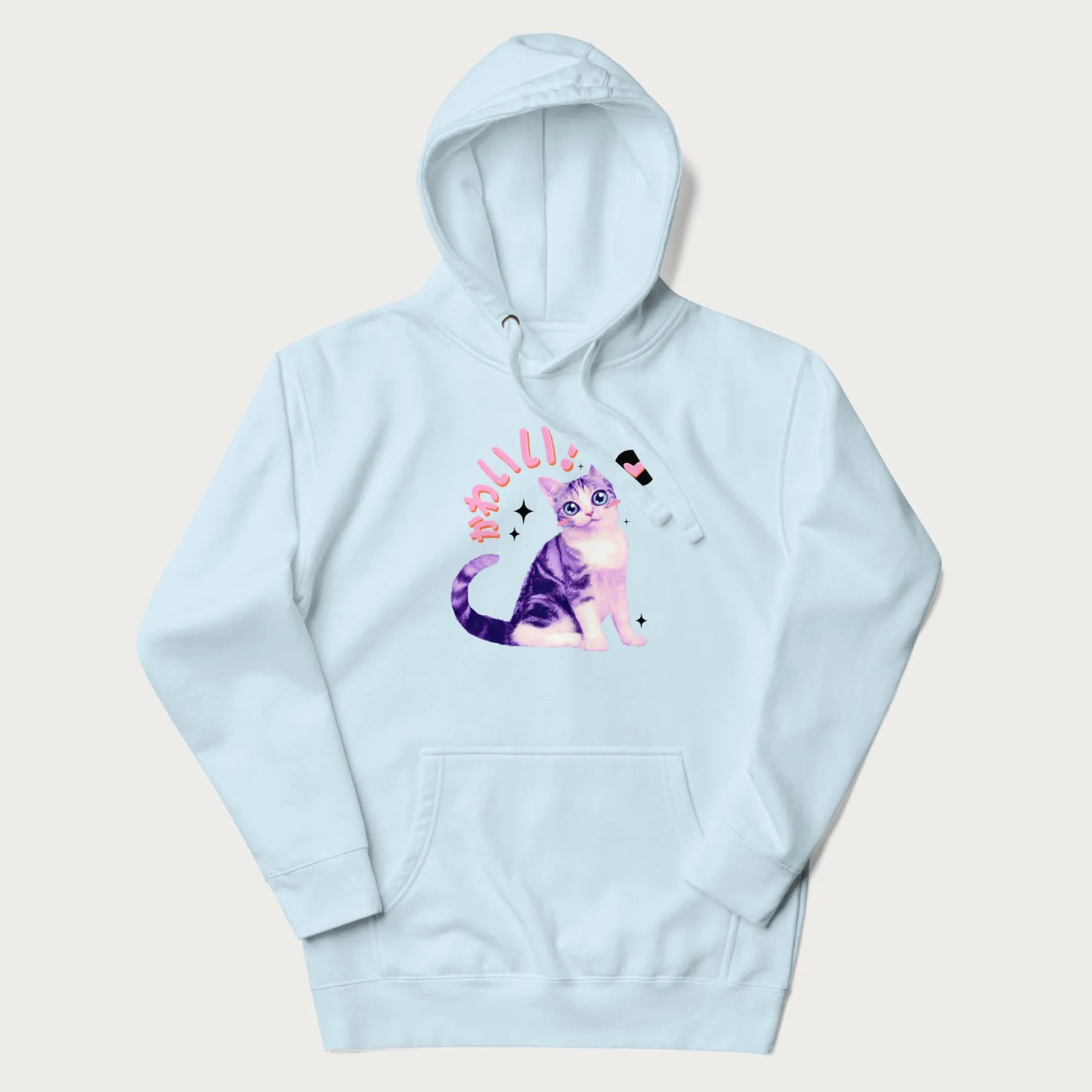 Light blue hoodie with a graphic of a blue-eyed kitten and Japanese kawaii-style lettering, stars, and a heart.