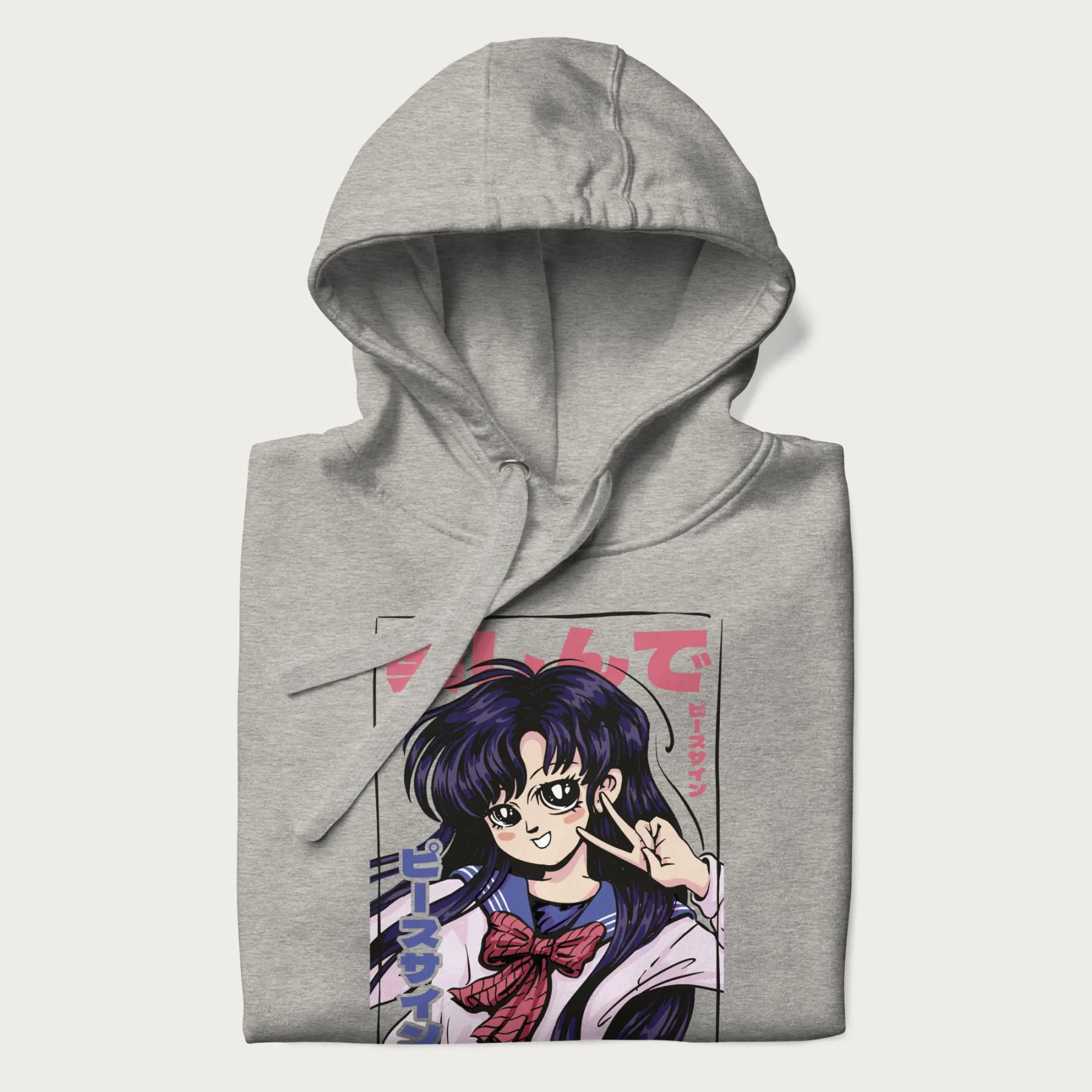 Folded light grey hoodie with Japanese graphic of an anime girl making a peace sign, with Japanese text '楽しんで' (Enjoy) and 'ピースサイン' (Peace Sign).