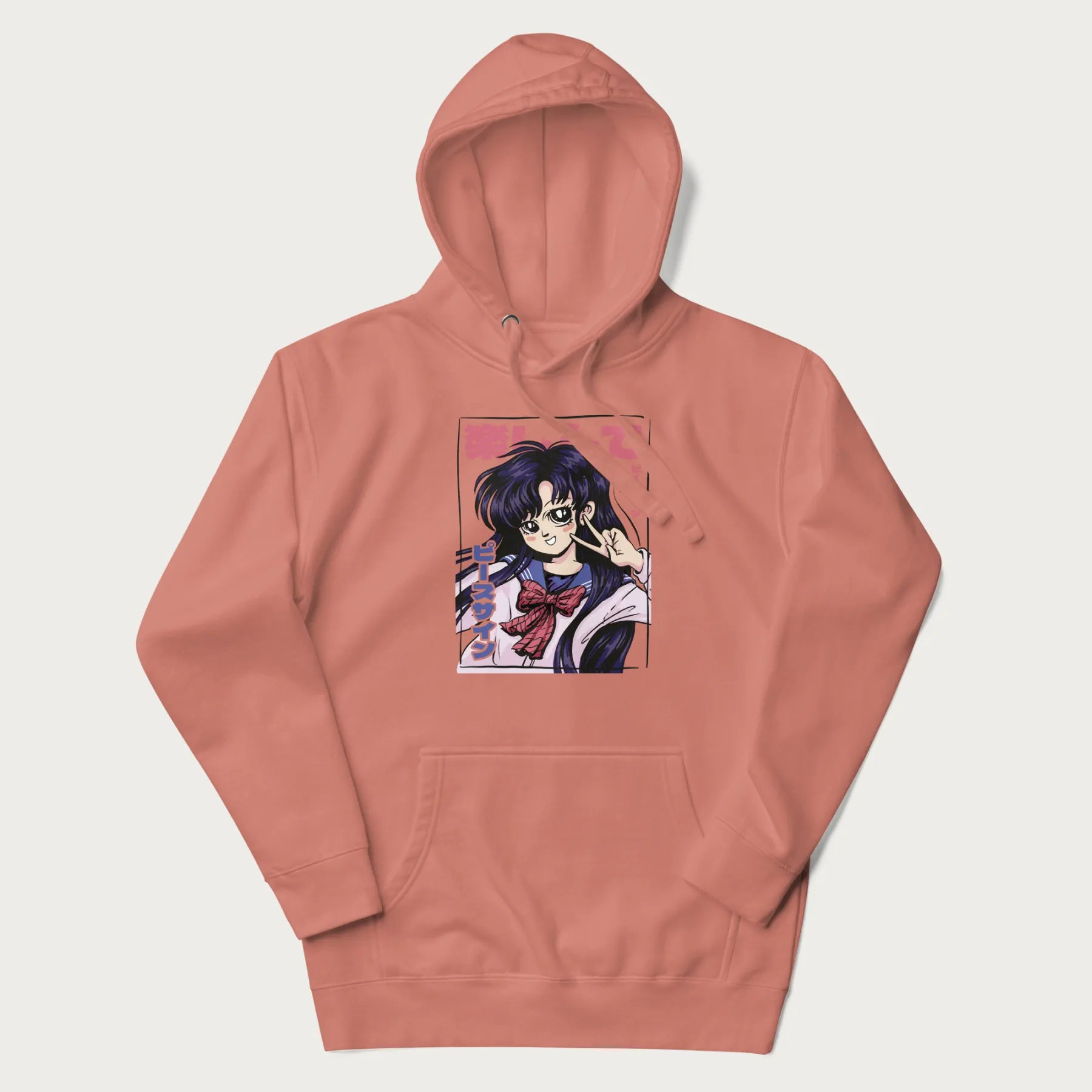 Light pink hoodie with Japanese graphic of an anime girl making a peace sign, with Japanese text '楽しんで' (Enjoy) and 'ピースサイン' (Peace Sign).