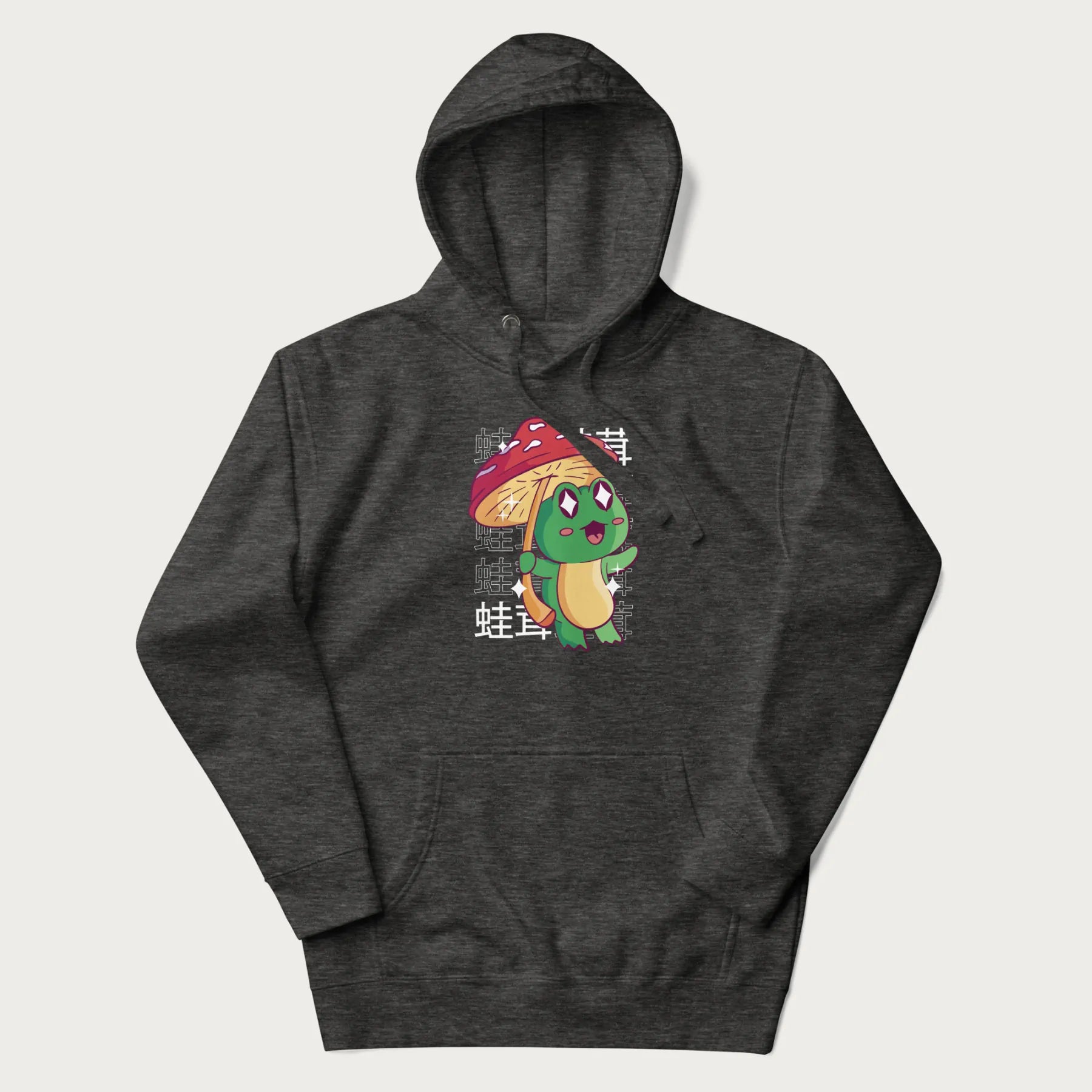 Dark grey hoodie with Japanese graphic of a cute green frog holding a red mushroom and Japanese text '蛙茸' in the background.