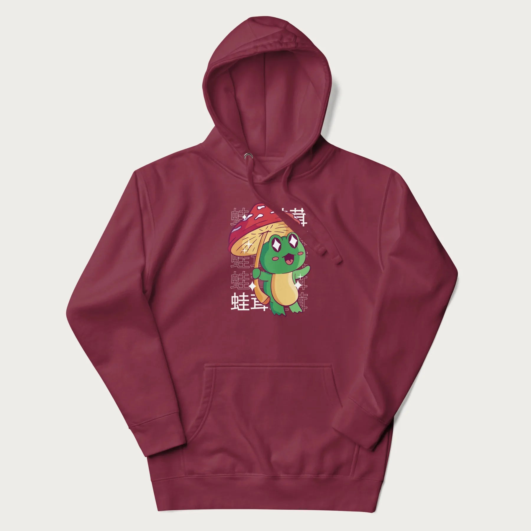 Maroon hoodie with Japanese graphic of a cute green frog holding a red mushroom and Japanese text '蛙茸' in the background.